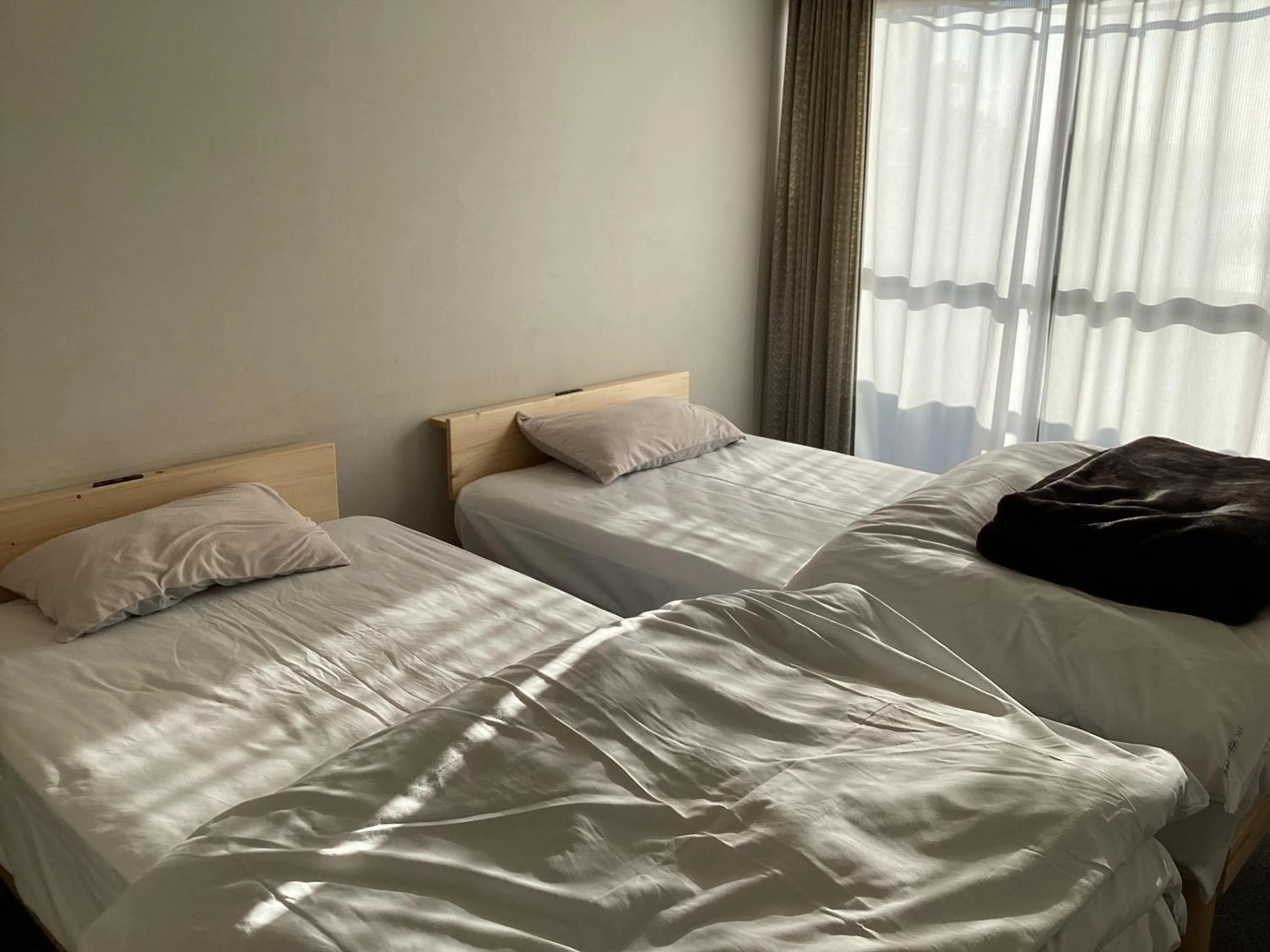 Bed in Katsuura Seaside Hotel