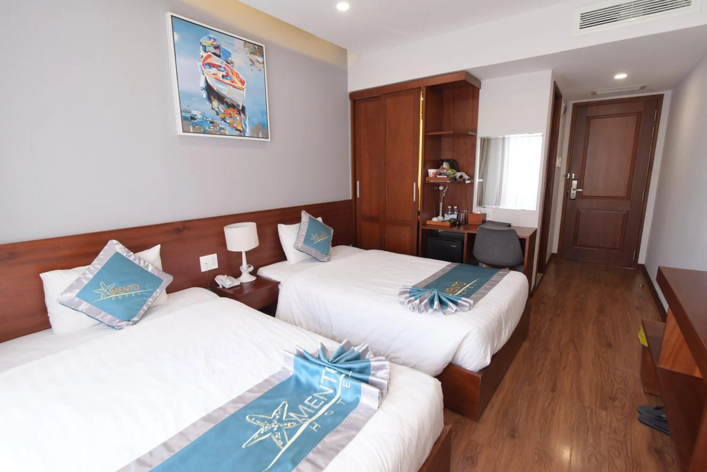 Bed in MENTO HOTEL QUY NHƠN
