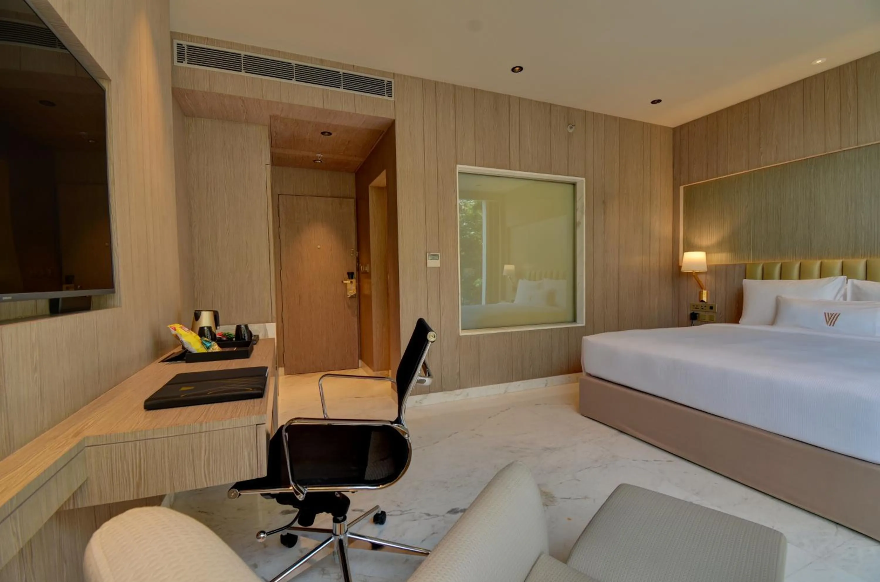 Seating area, Bed in Vividus