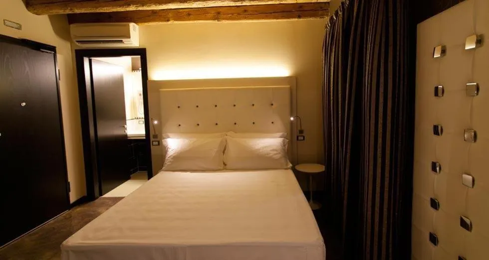 Bed in Villa Solaris Hotel & Residence