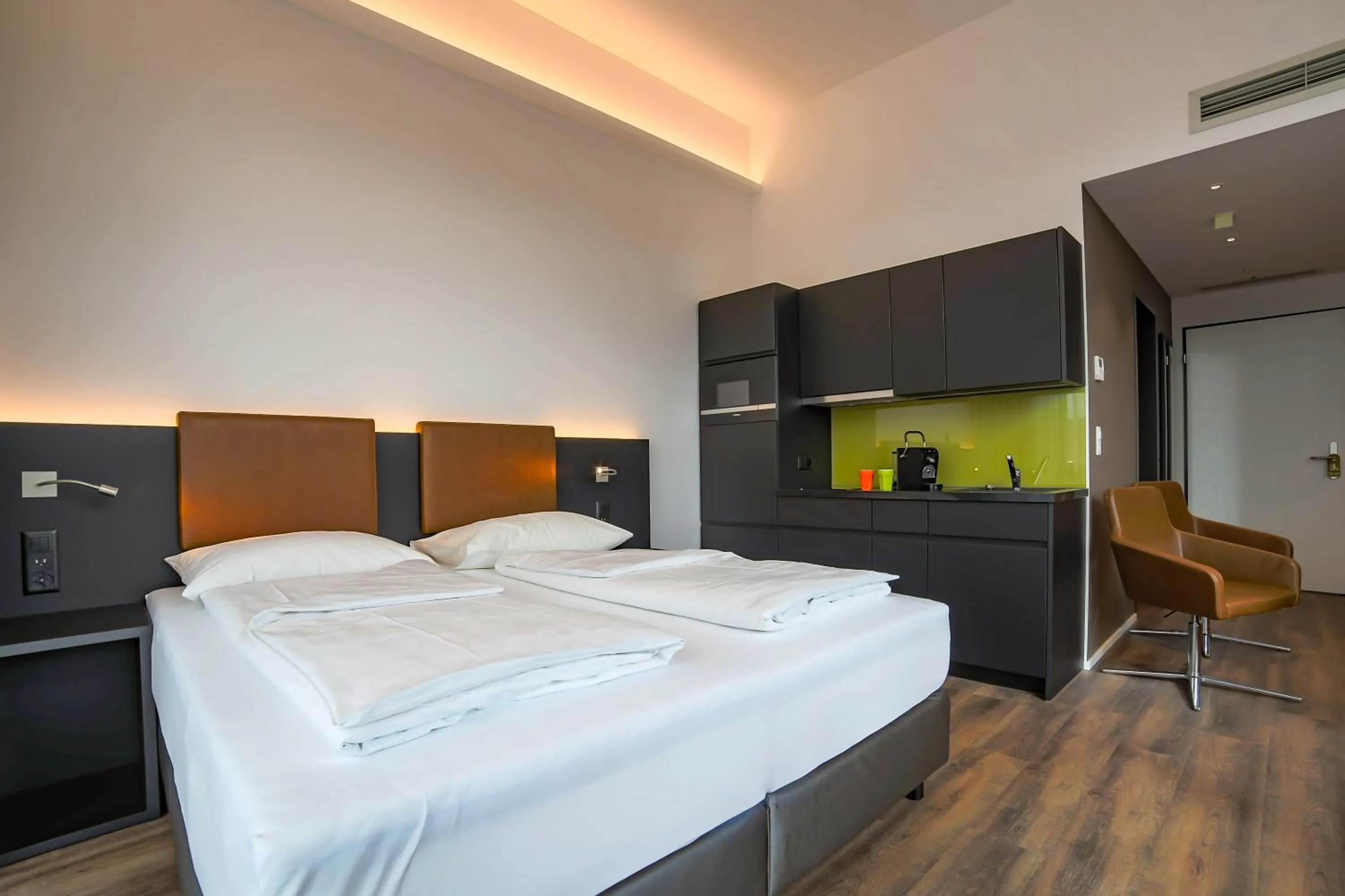 Bed in Self Check-in Hotel von Rotz