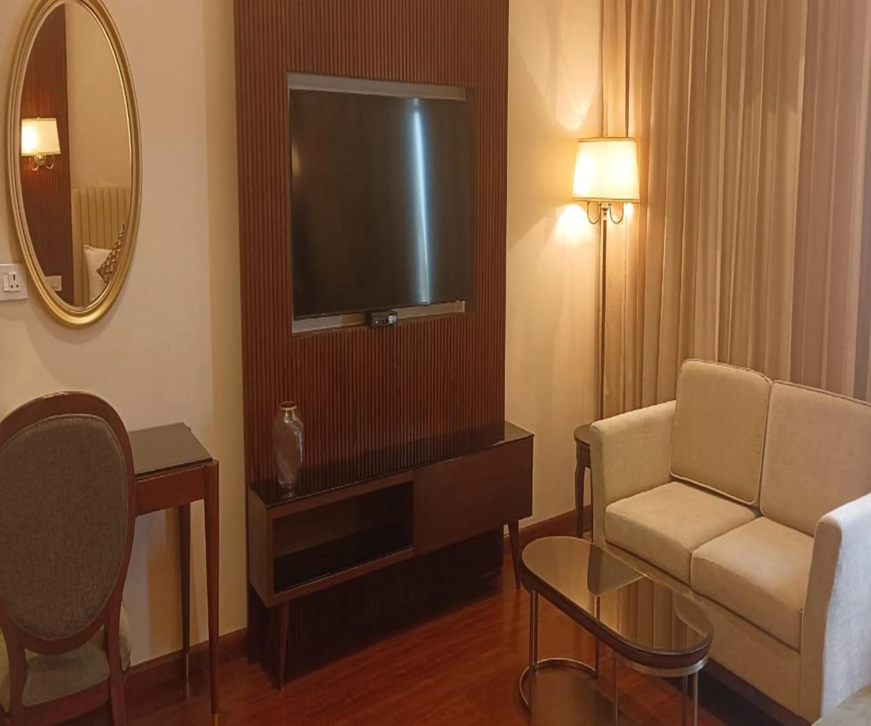 Living room in Hotel Home In By Amrik Sukhdev