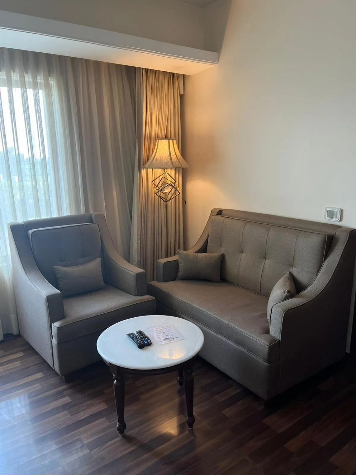 Living room in Hotel Home In By Amrik Sukhdev