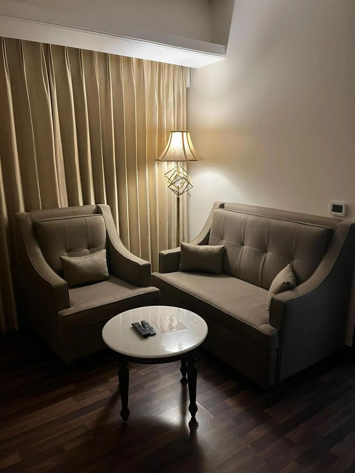 Living room in Hotel Home In By Amrik Sukhdev