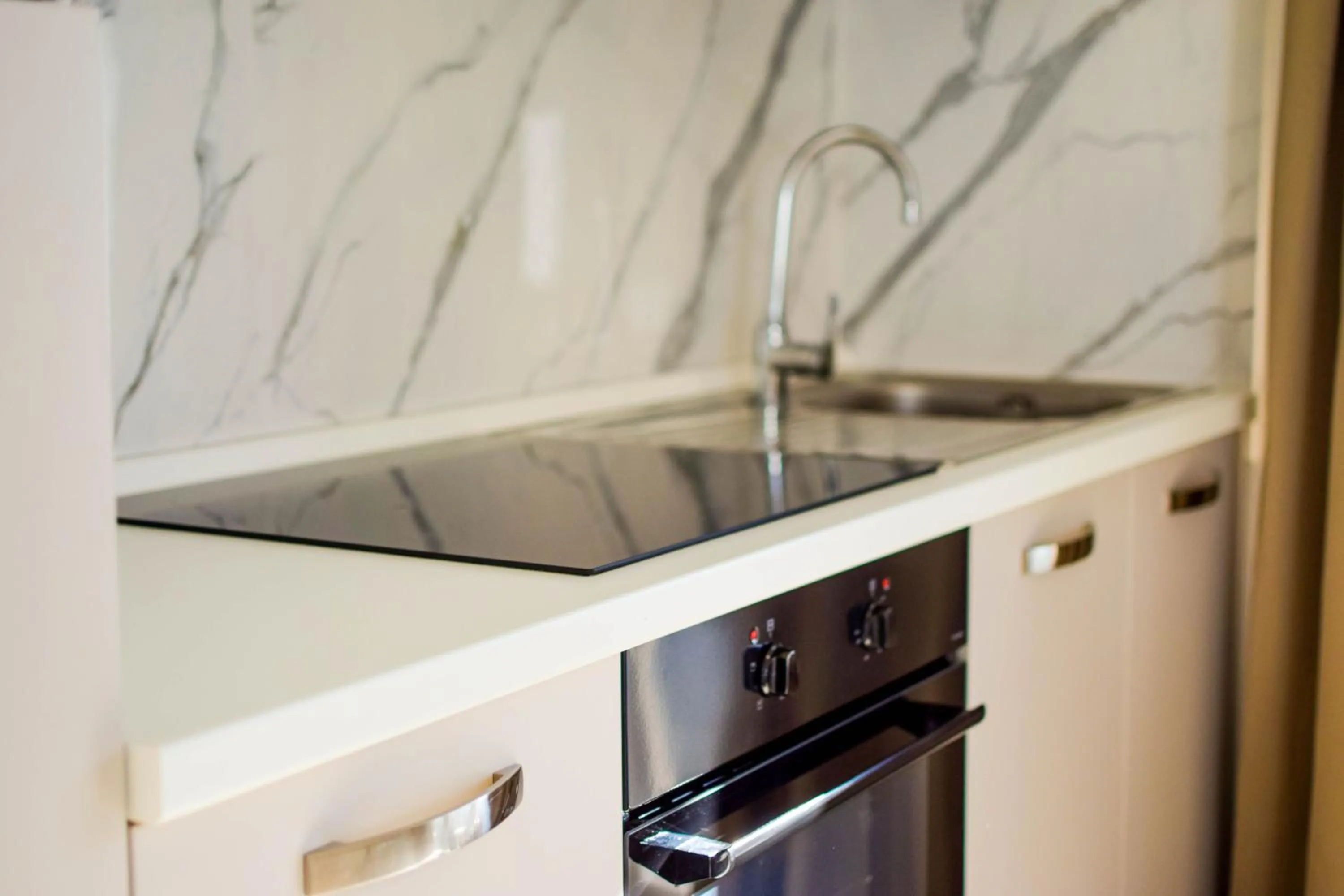 Kitchen or kitchenette in Golden Apartments