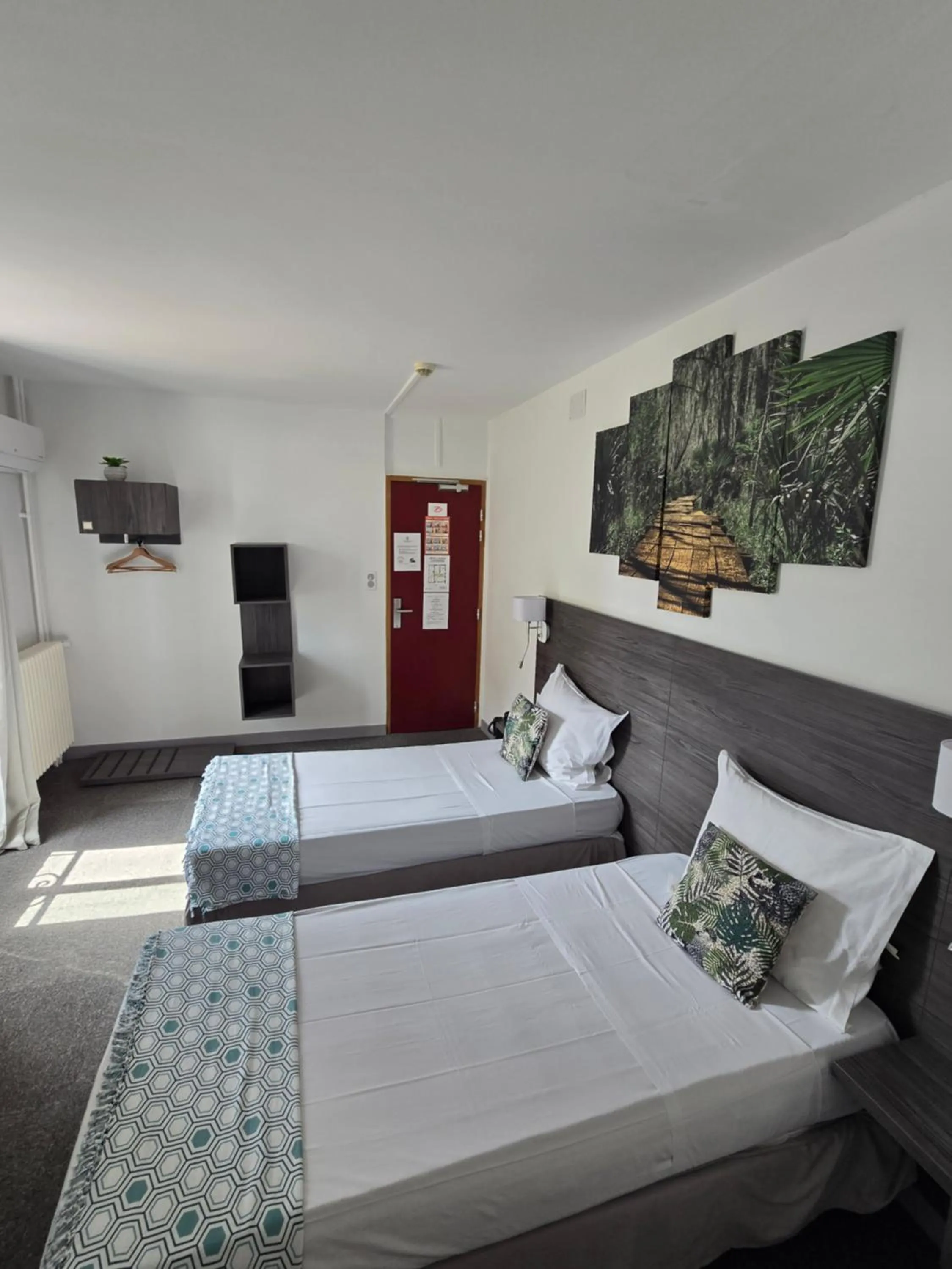 Bed in Hôtel L'Alsace