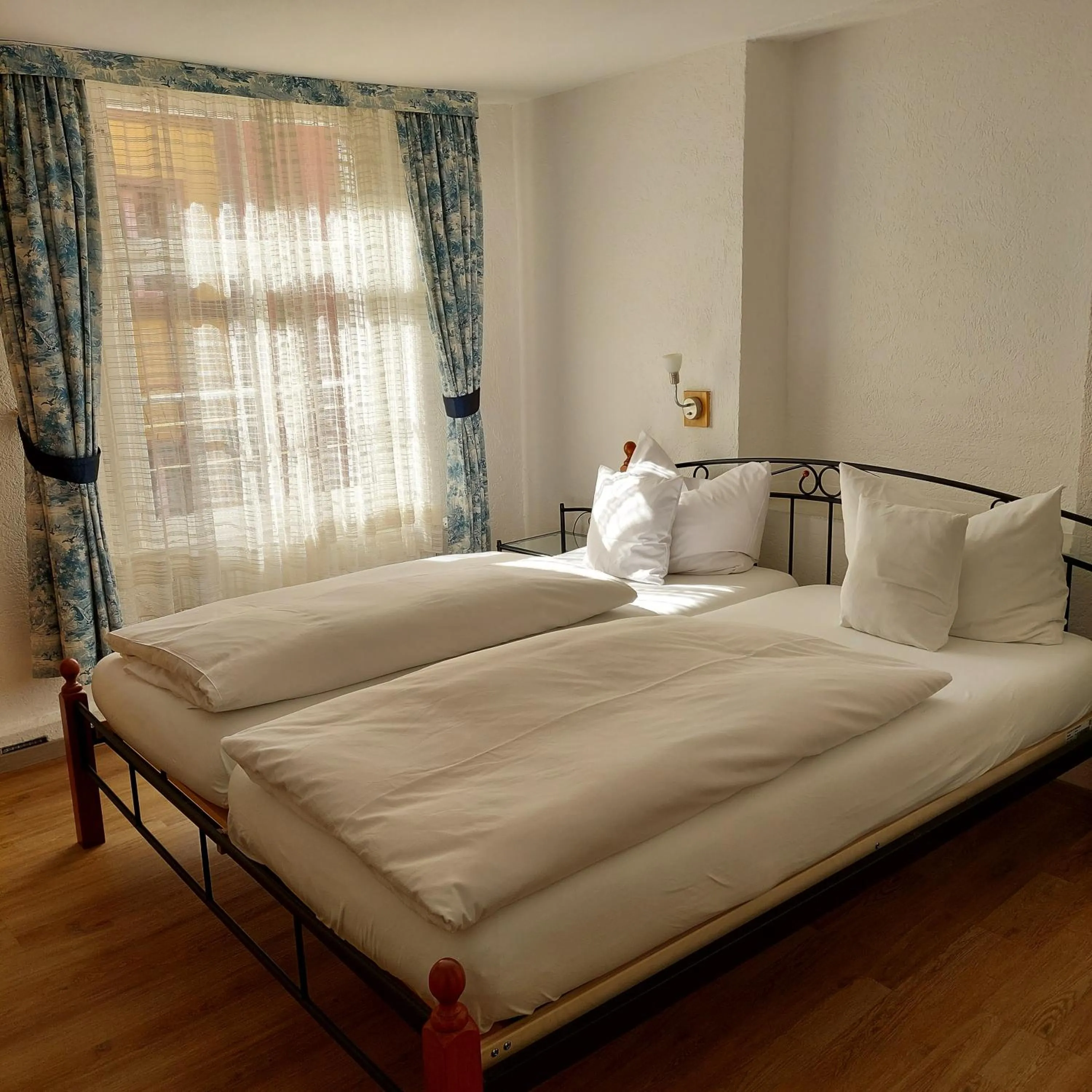 Bed in Hotel Gasthof Inselgraben garni