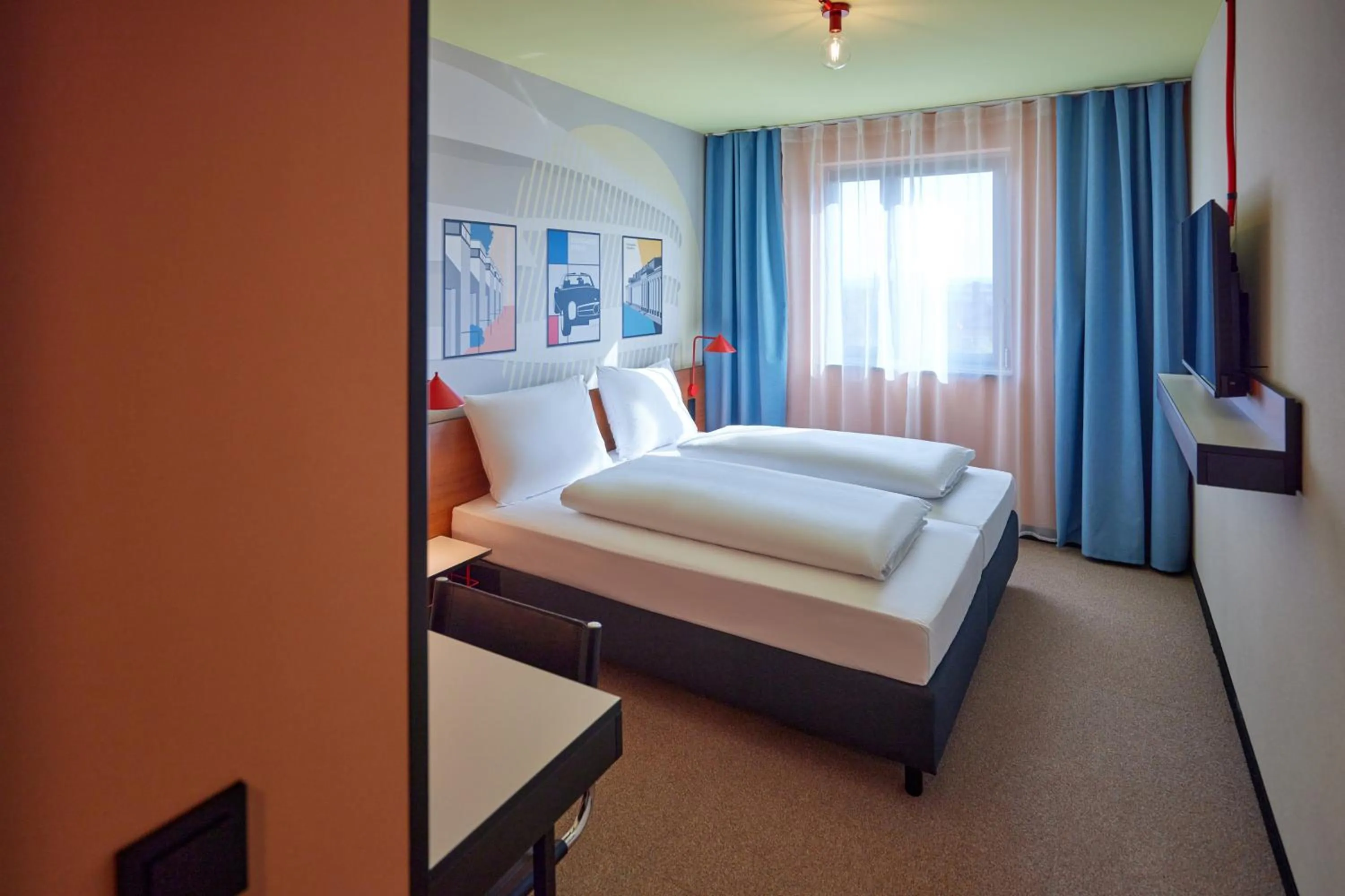Bed in McDreams Hotel Stuttgart-City