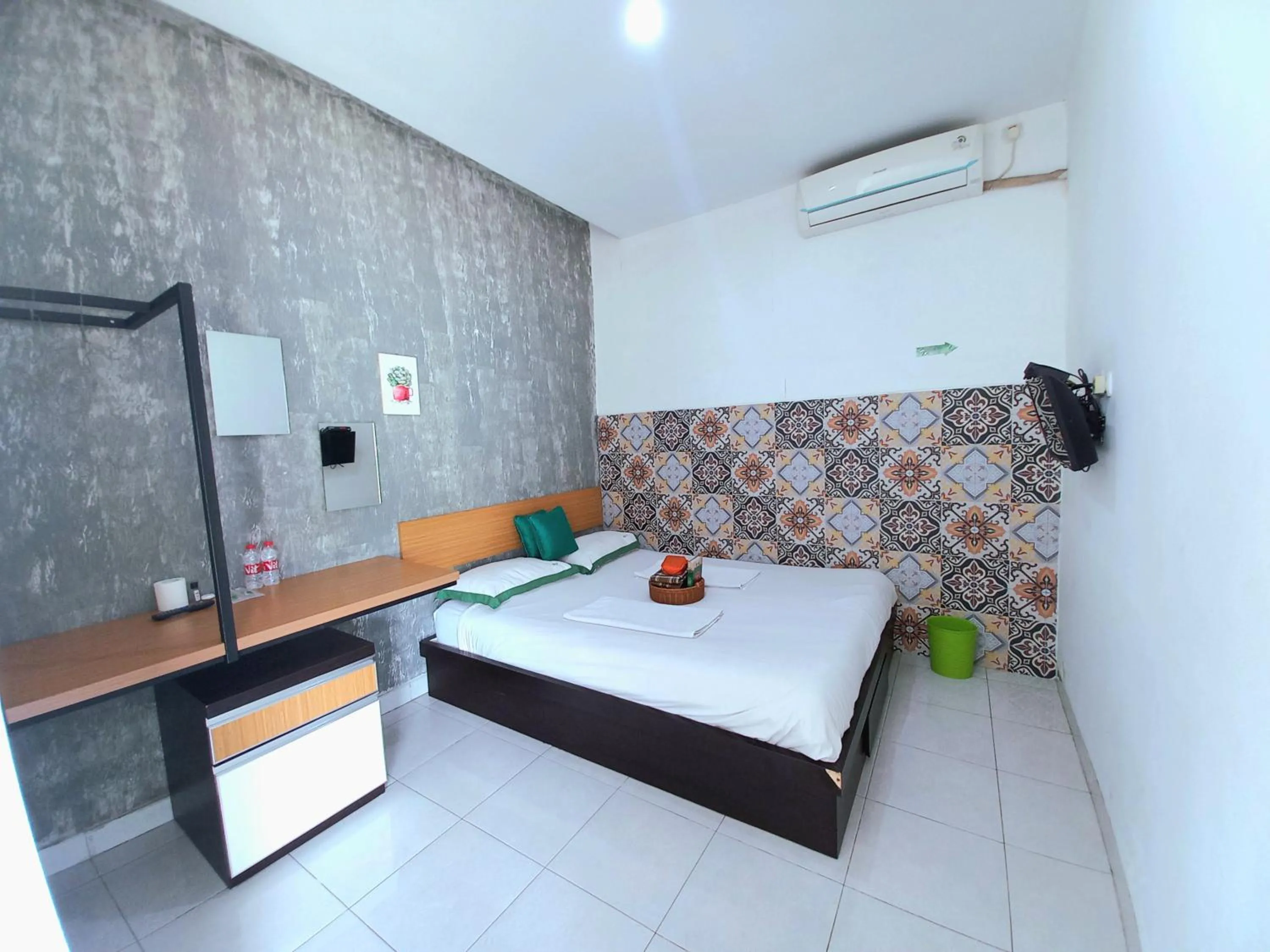 Bed in Hotel Jogja Kili Suci By Simply Homy