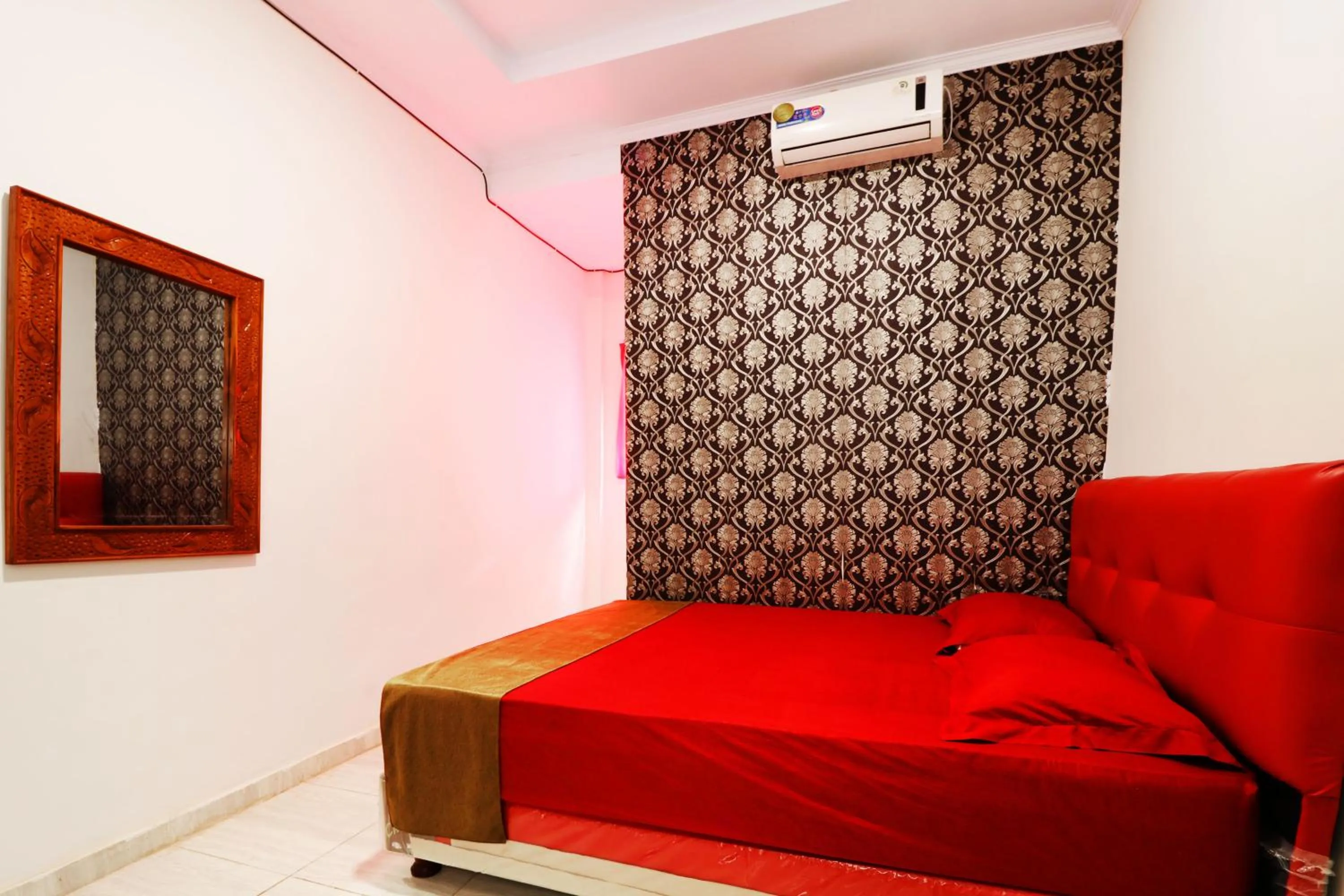 Bed in Ombey Guest House