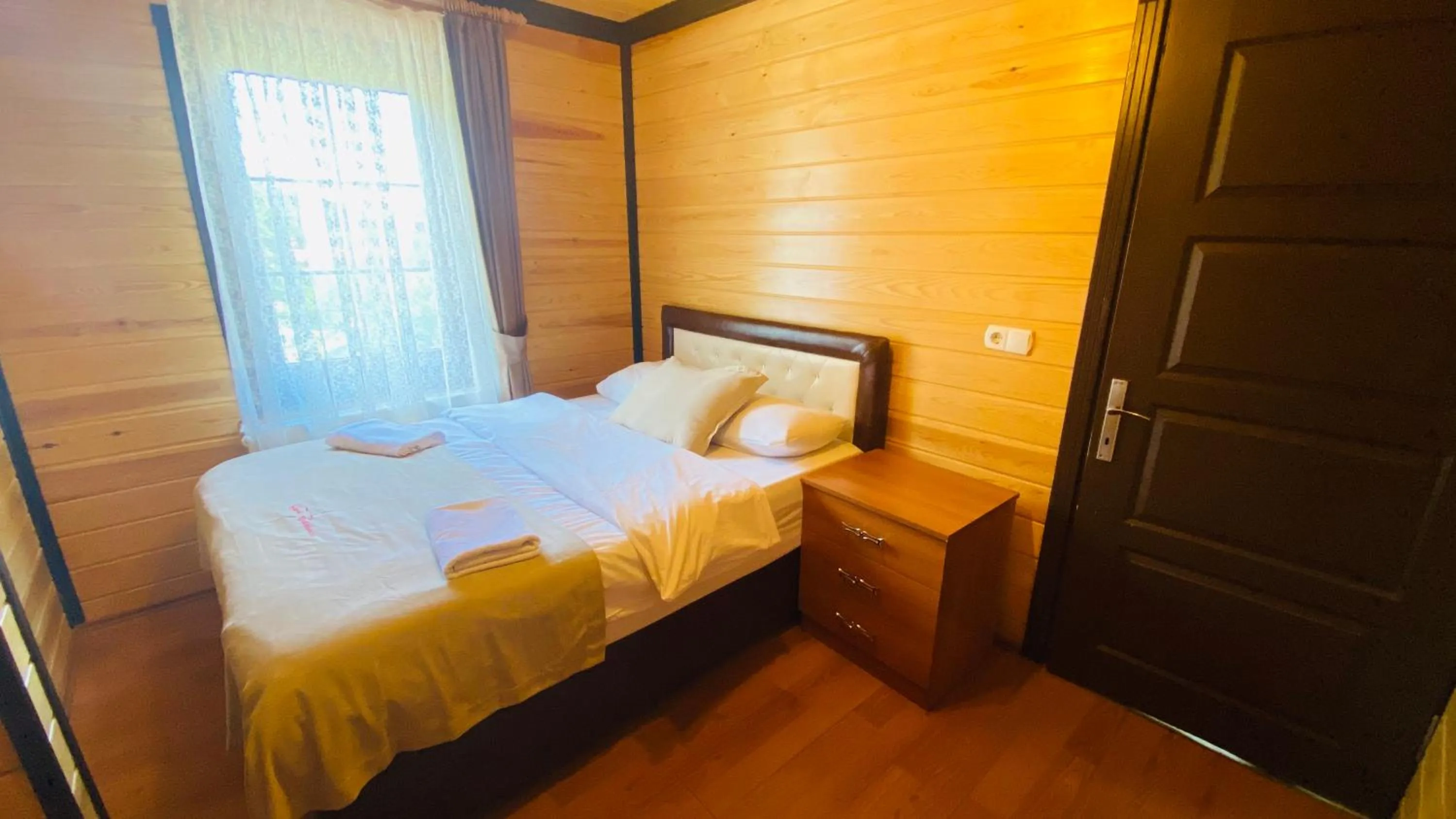 Bed in Kaya Residence