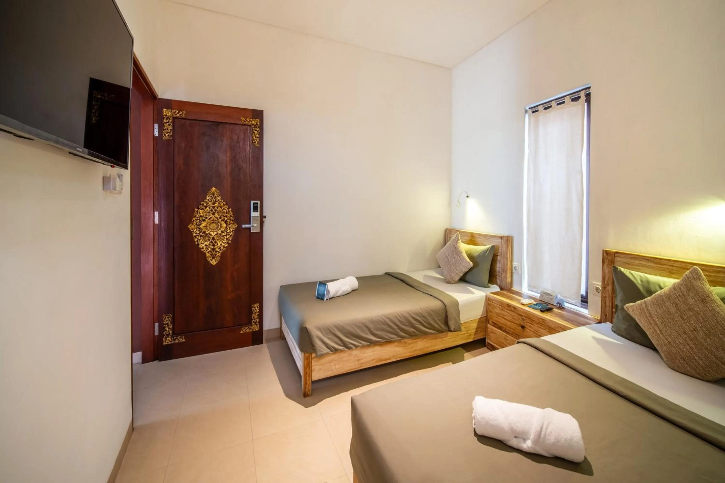 Bed in Gelatik Bed And Breakfast