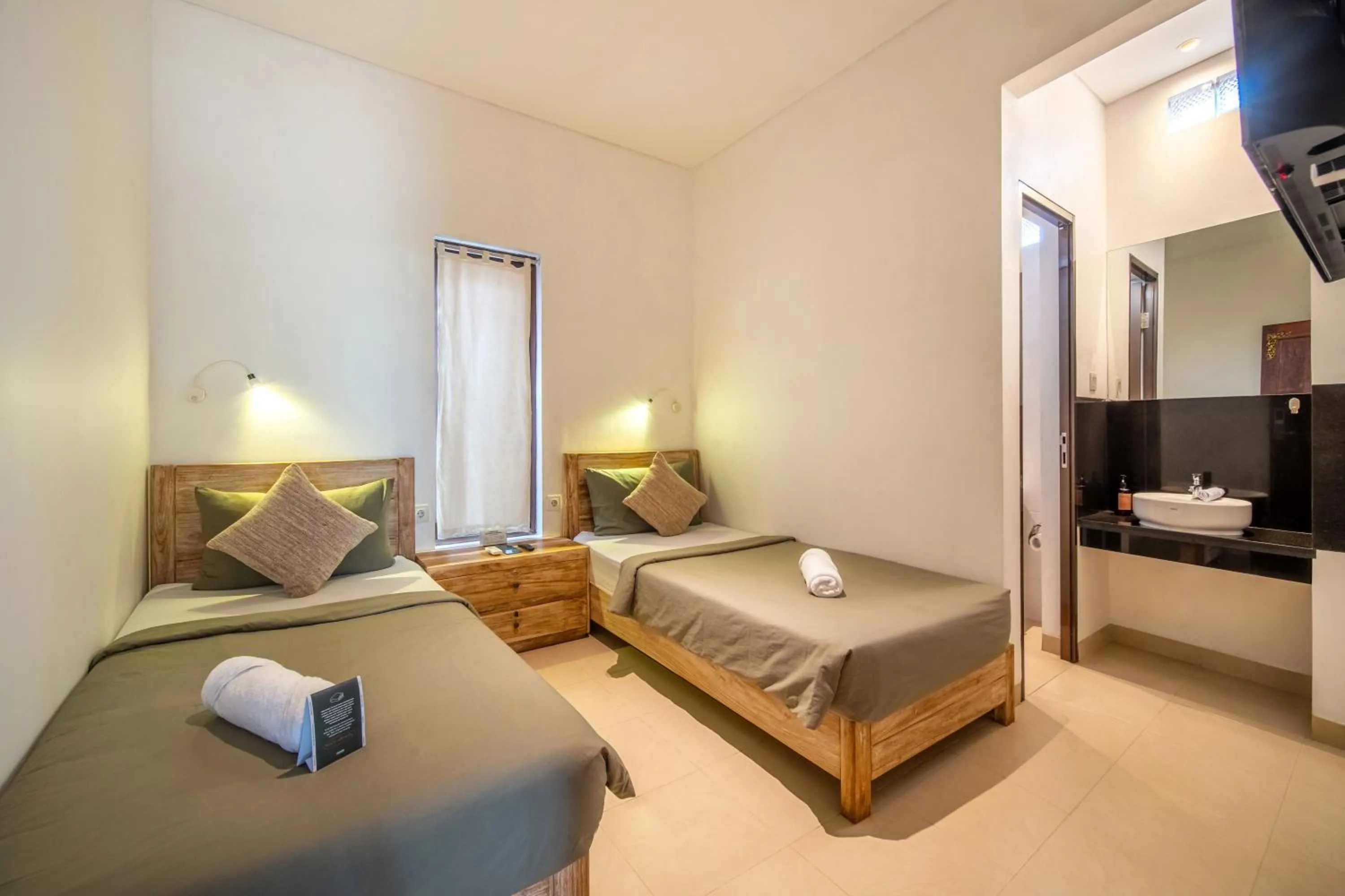 Bed in Gelatik Bed And Breakfast