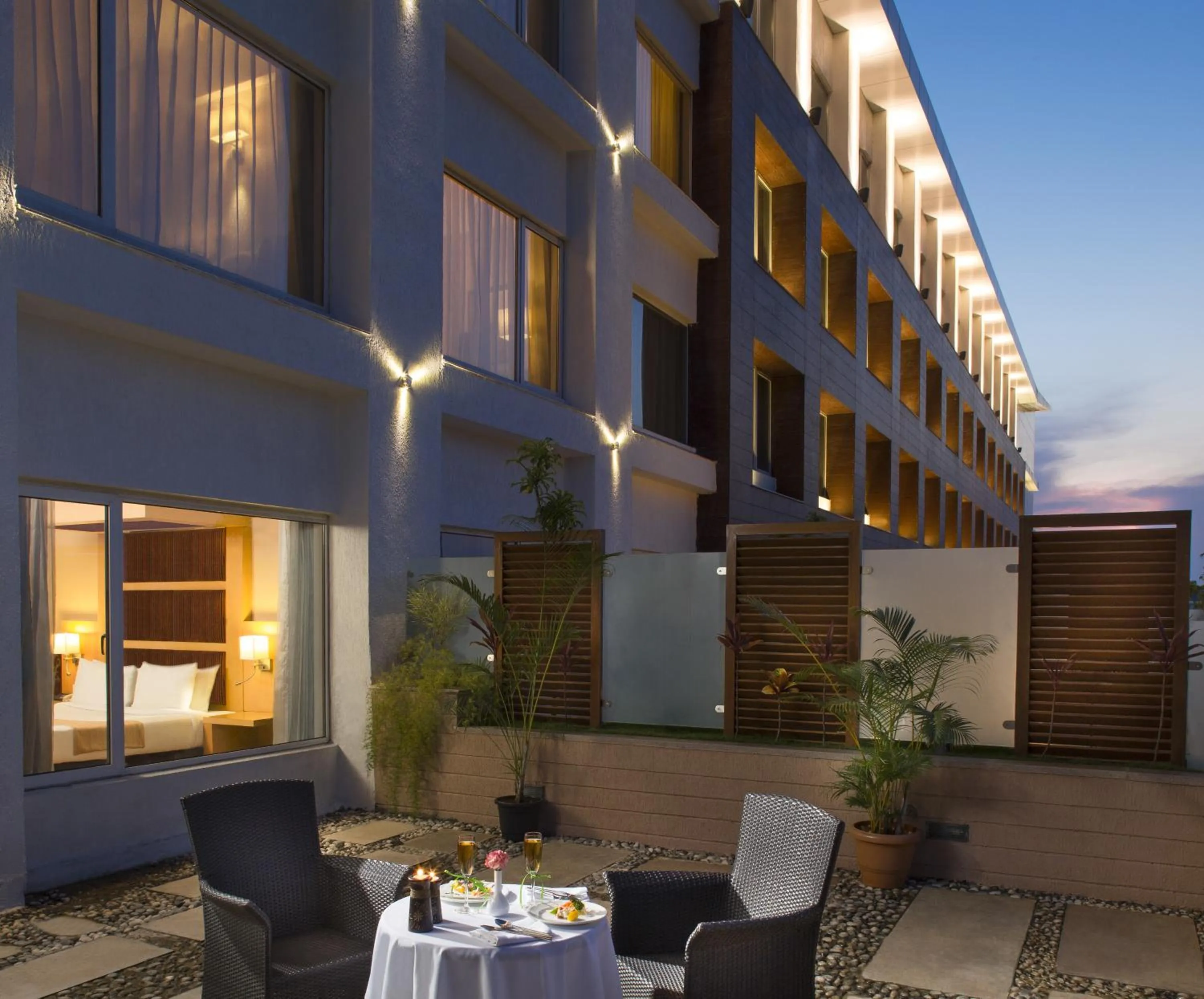 Facade/entrance in Mysore County Retreat