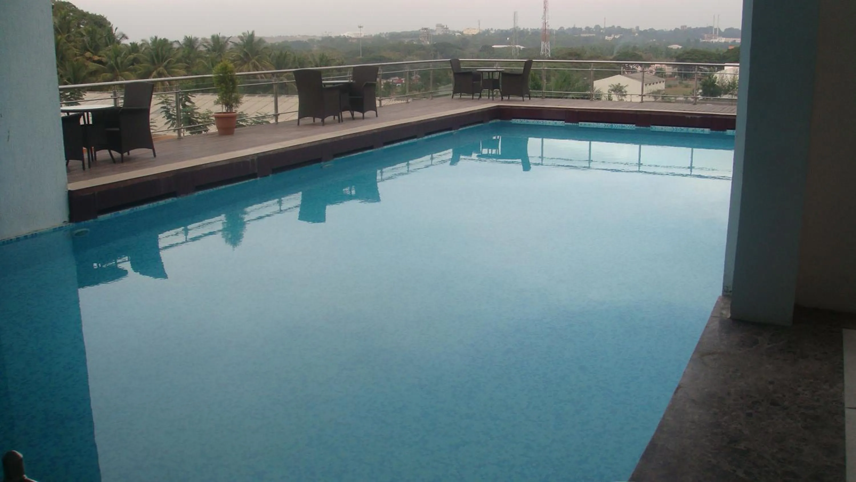 Swimming pool in Mysore County Retreat