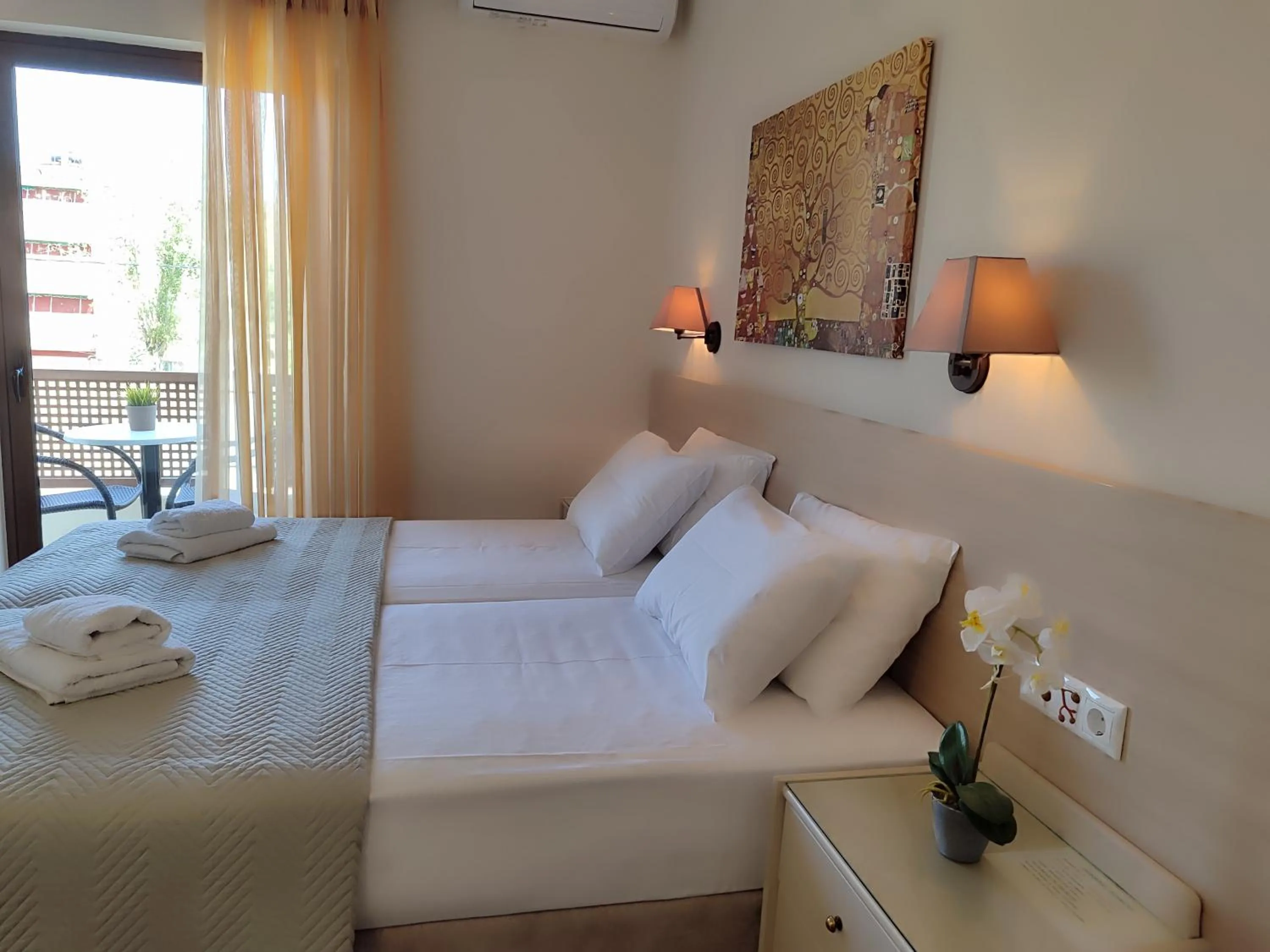 Bed in Hotel Prigipikon Suites and sofites