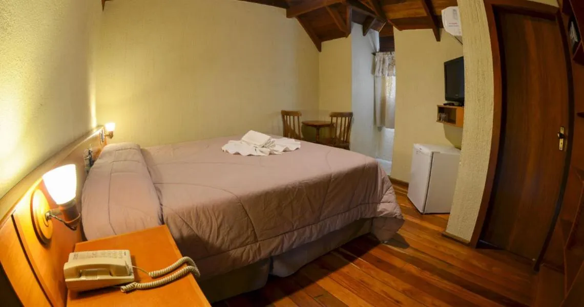 Bed in Hotel Aconchego da Serra