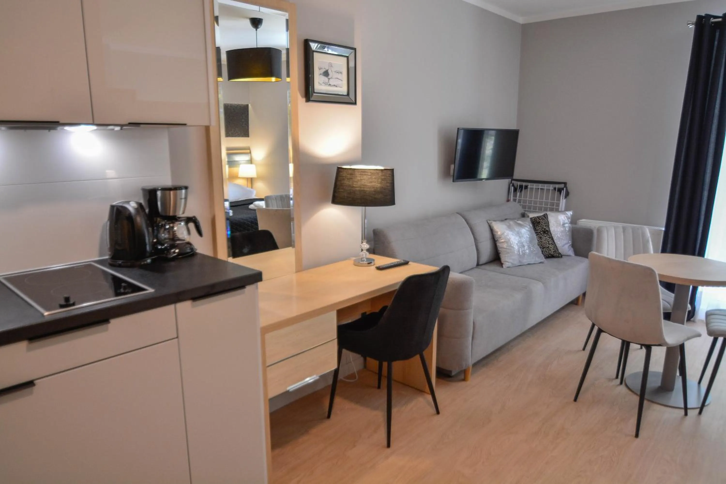 TV and multimedia in Osiedle Cesarskie Apartamenty - Parking - Apartamenty Bryza