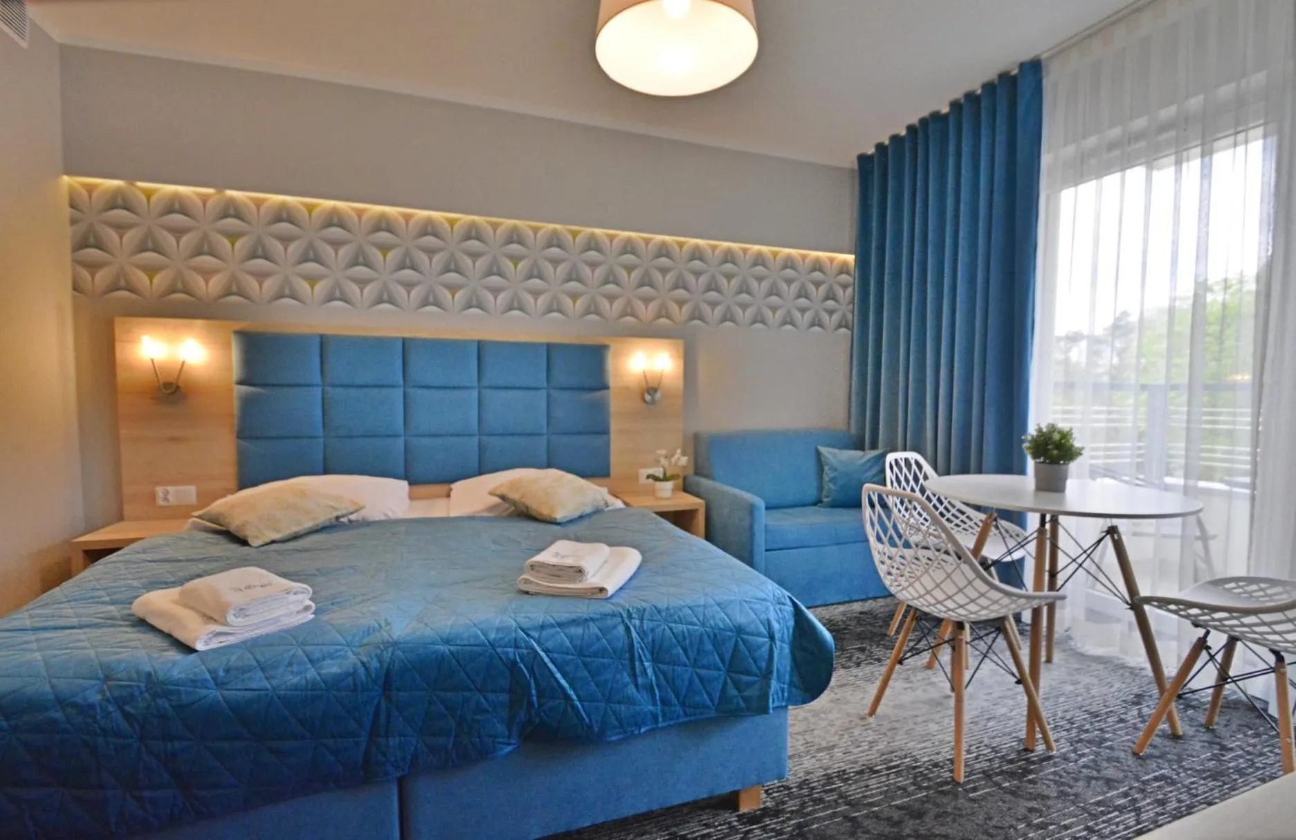 Bed in Osiedle Cesarskie Apartamenty - Parking - Apartamenty Bryza