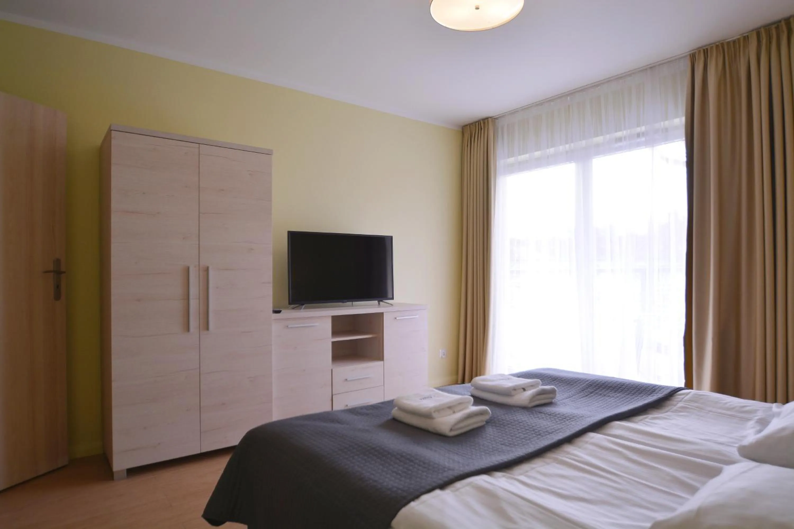 Bedroom, Bed in Osiedle Cesarskie Apartamenty - Parking - Apartamenty Bryza