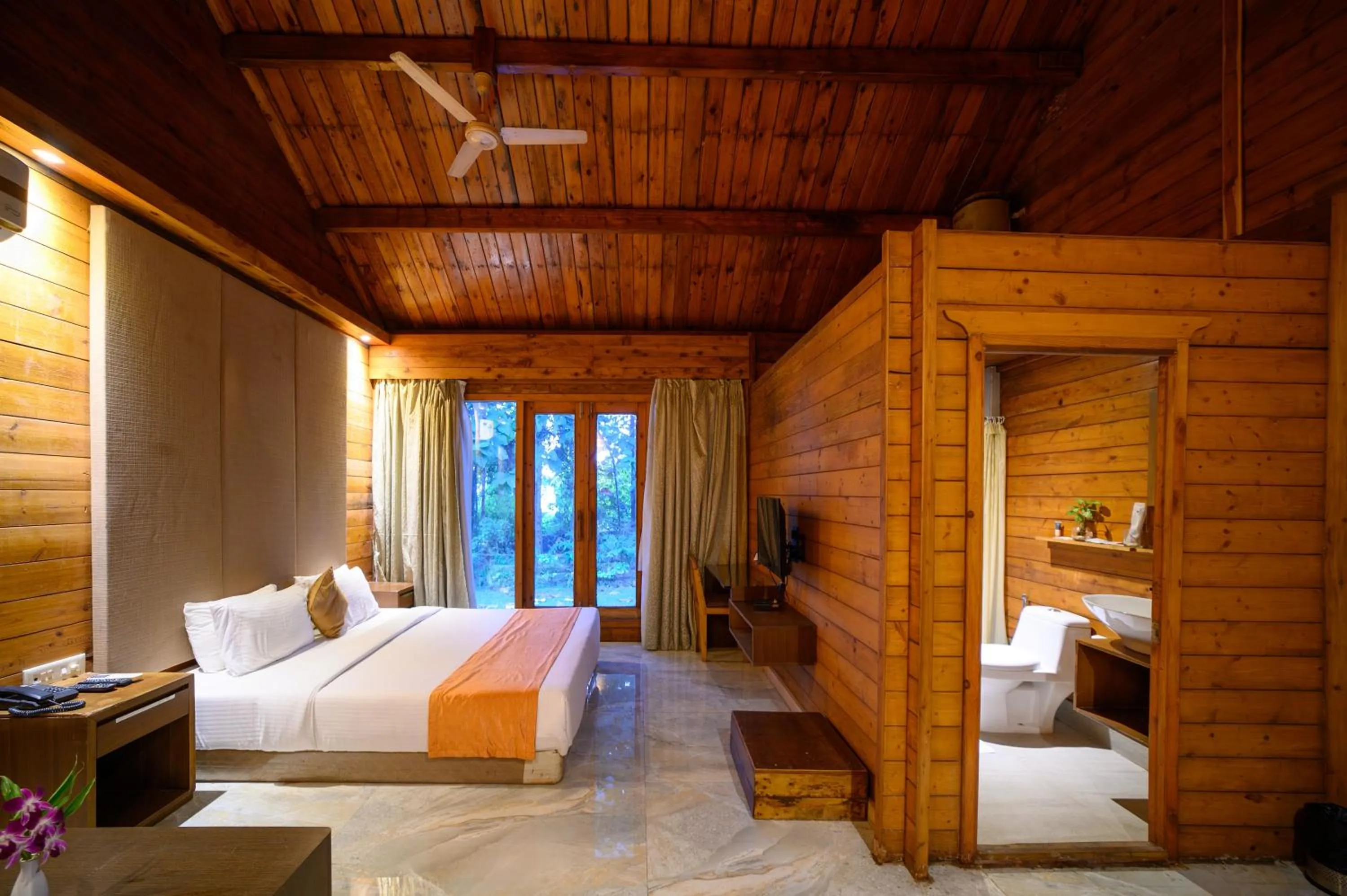 Photo of the whole room, Bed in Sinclairs Retreat Dooars, Chalsa