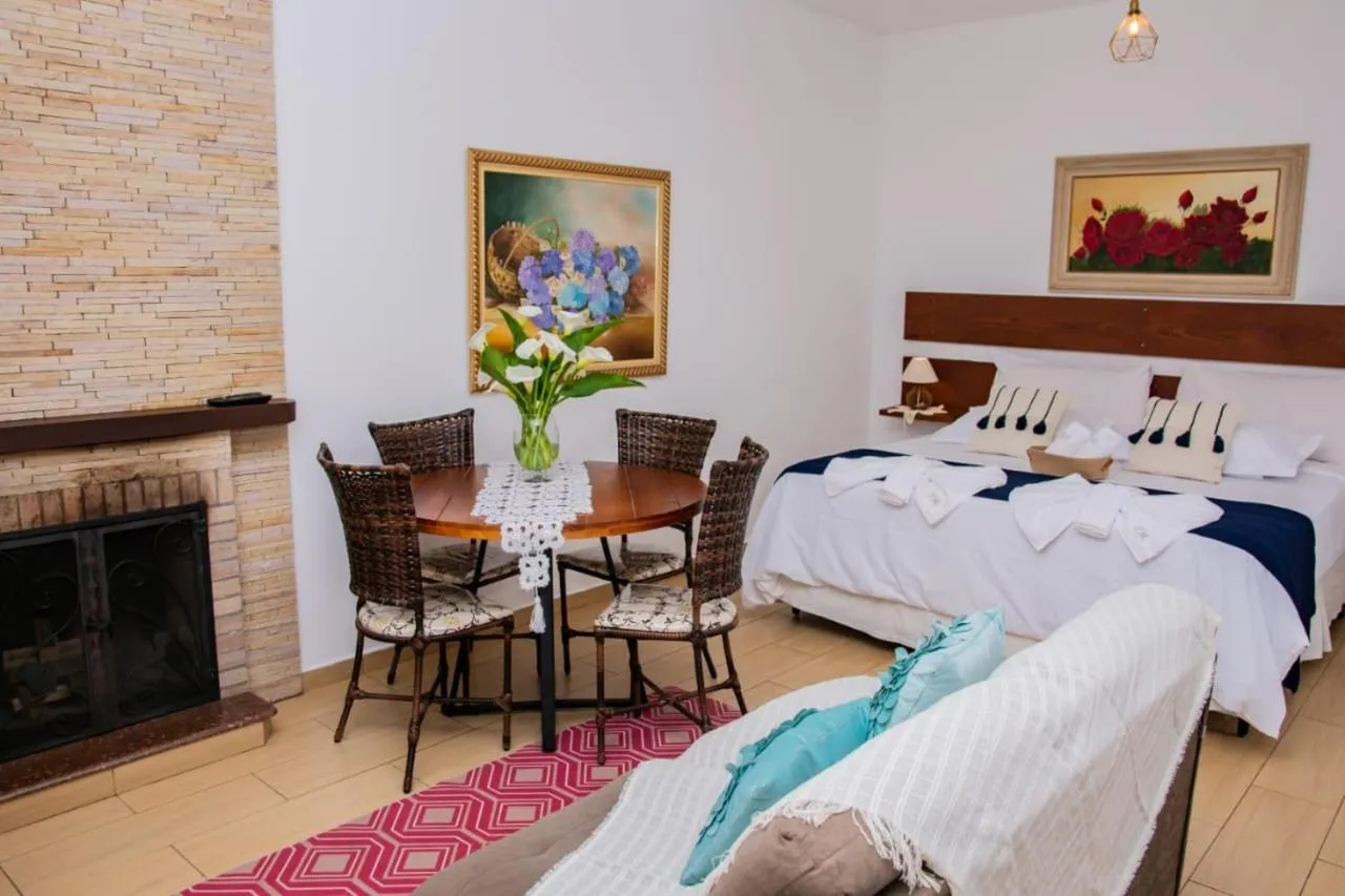 Bed in Pousada Medeiros