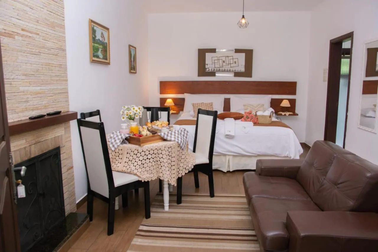 Bed in Pousada Medeiros