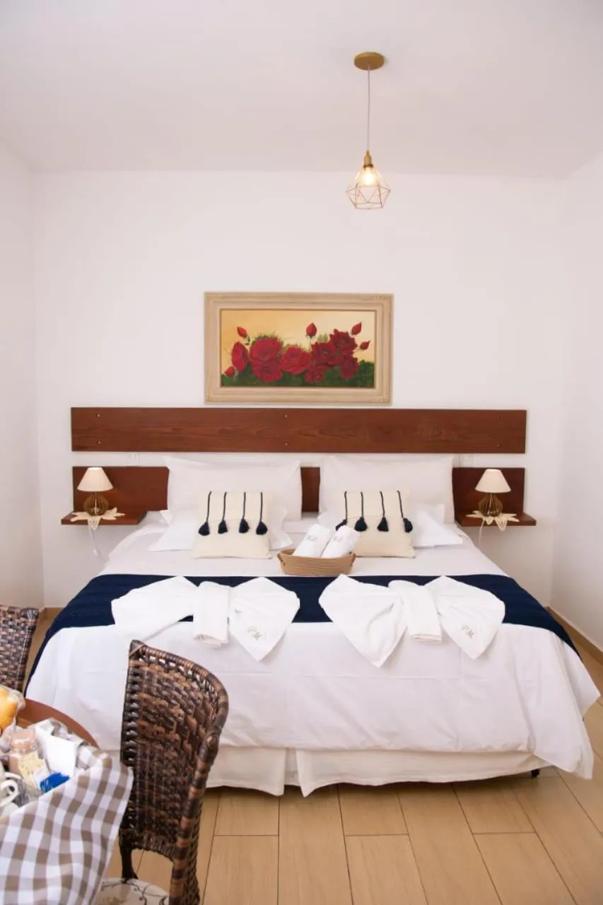 Bed in Pousada Medeiros