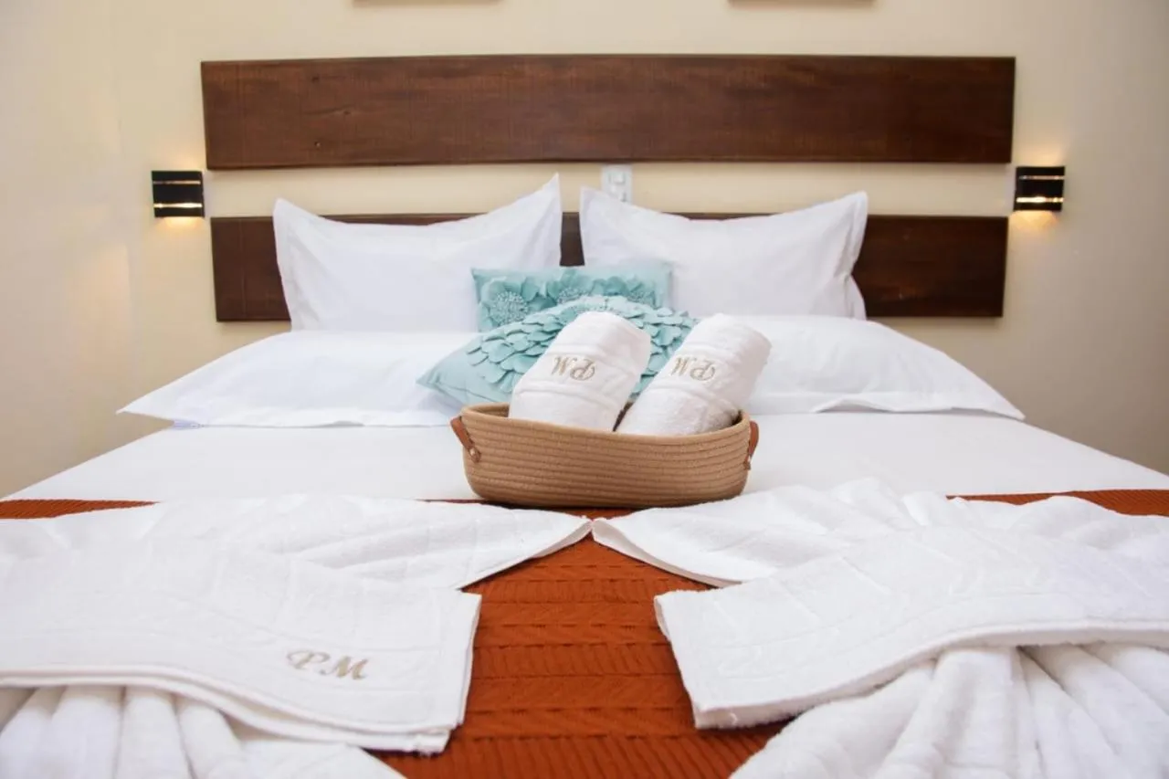 Bed in Pousada Medeiros