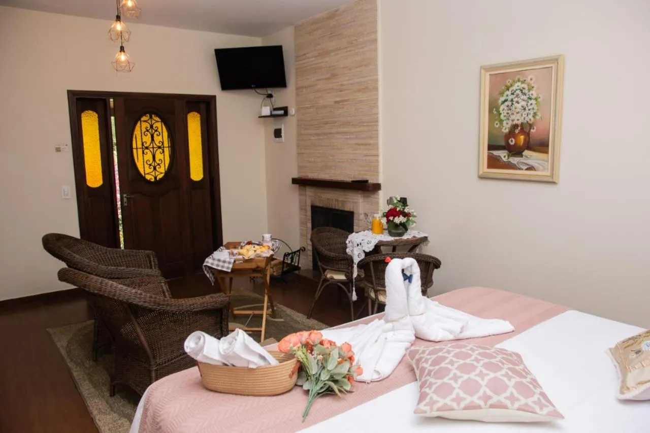 Bed in Pousada Medeiros