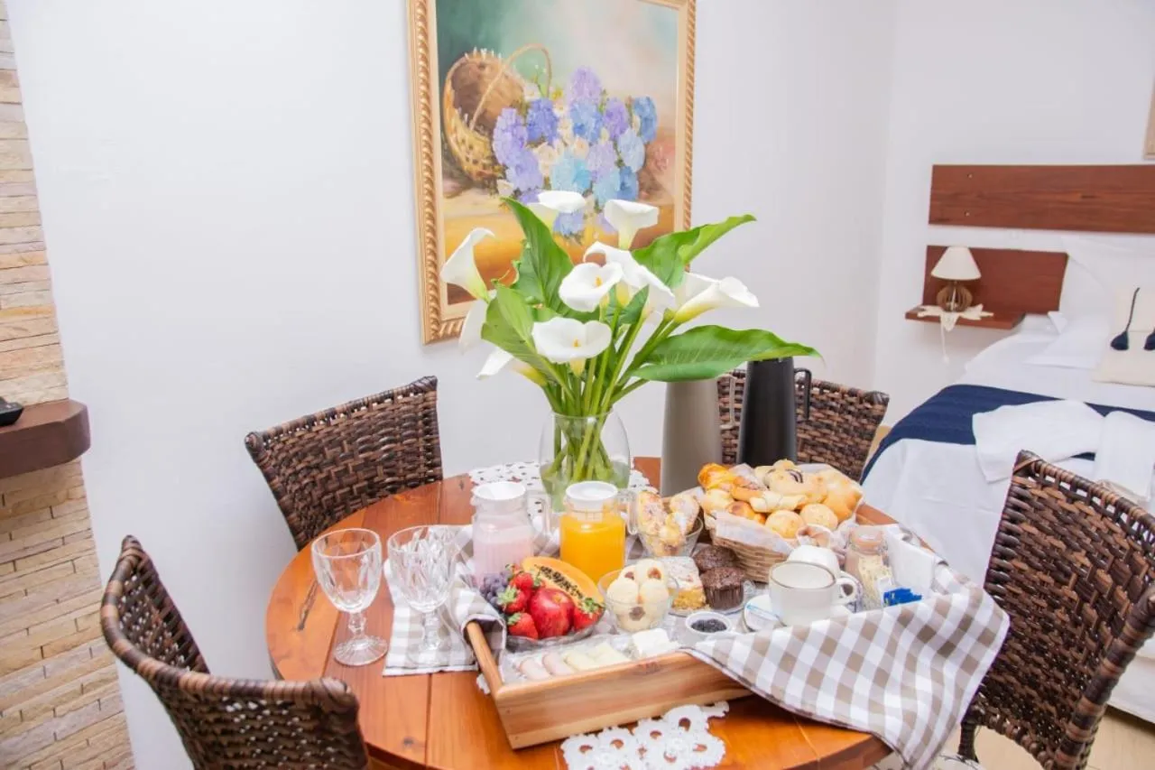 Bed in Pousada Medeiros