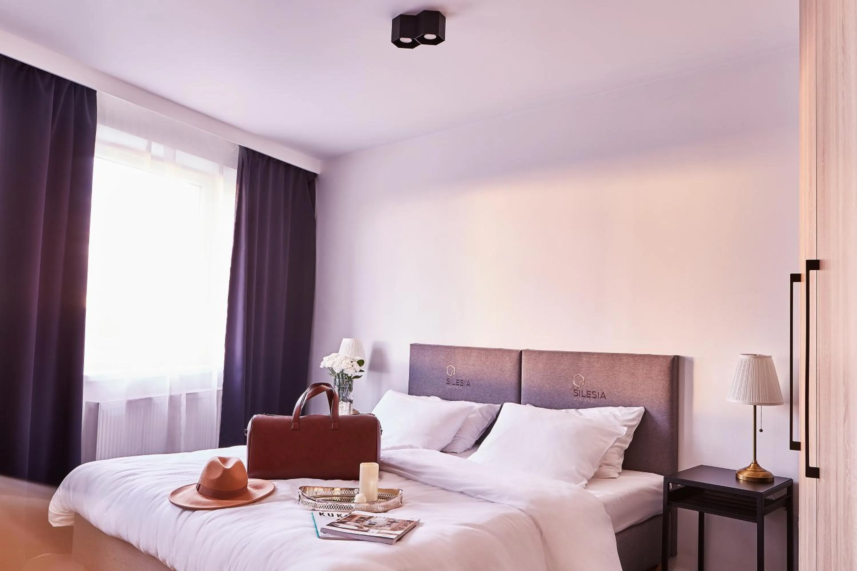 Bed in Silesia Apartments