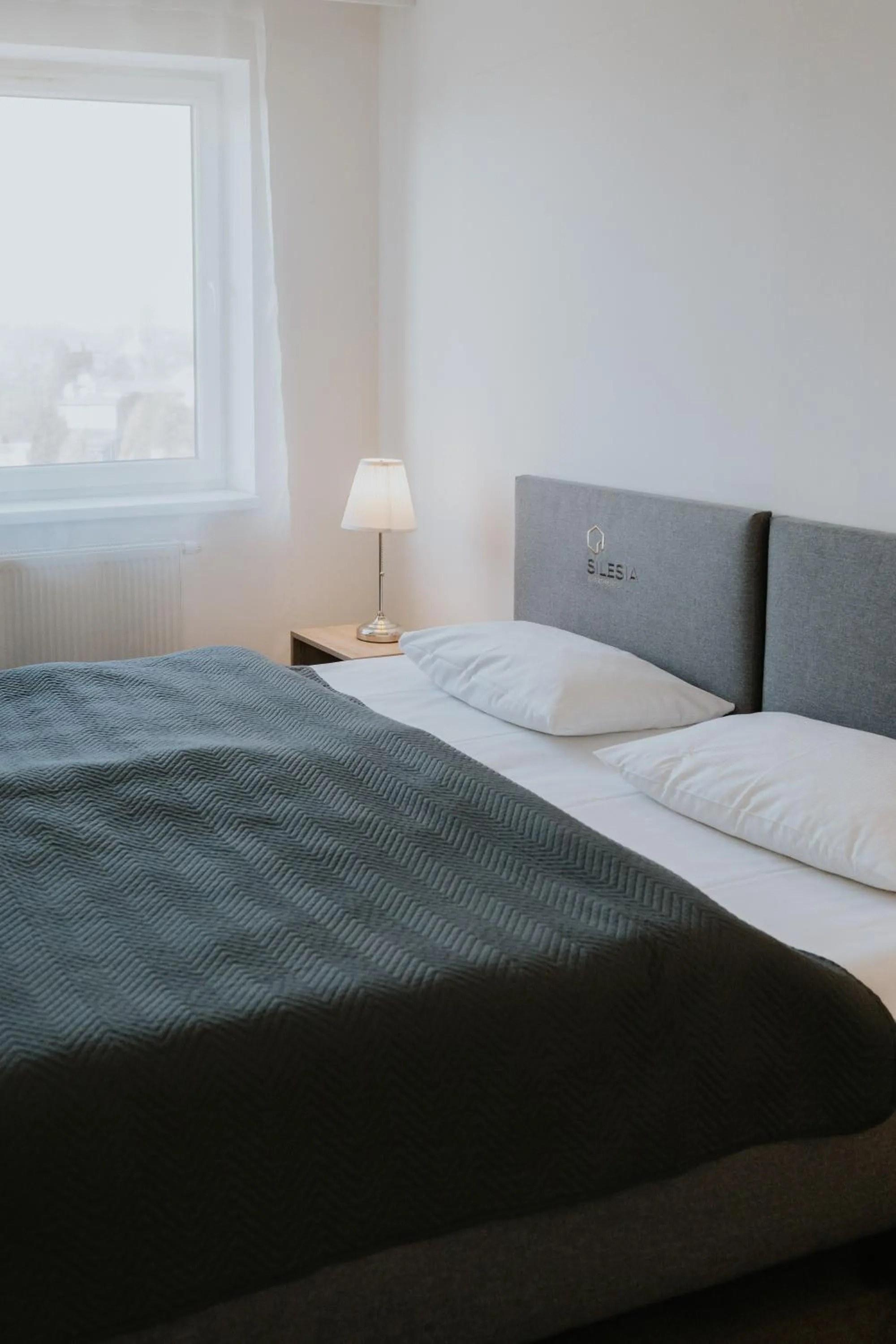 Bed in Silesia Apartments