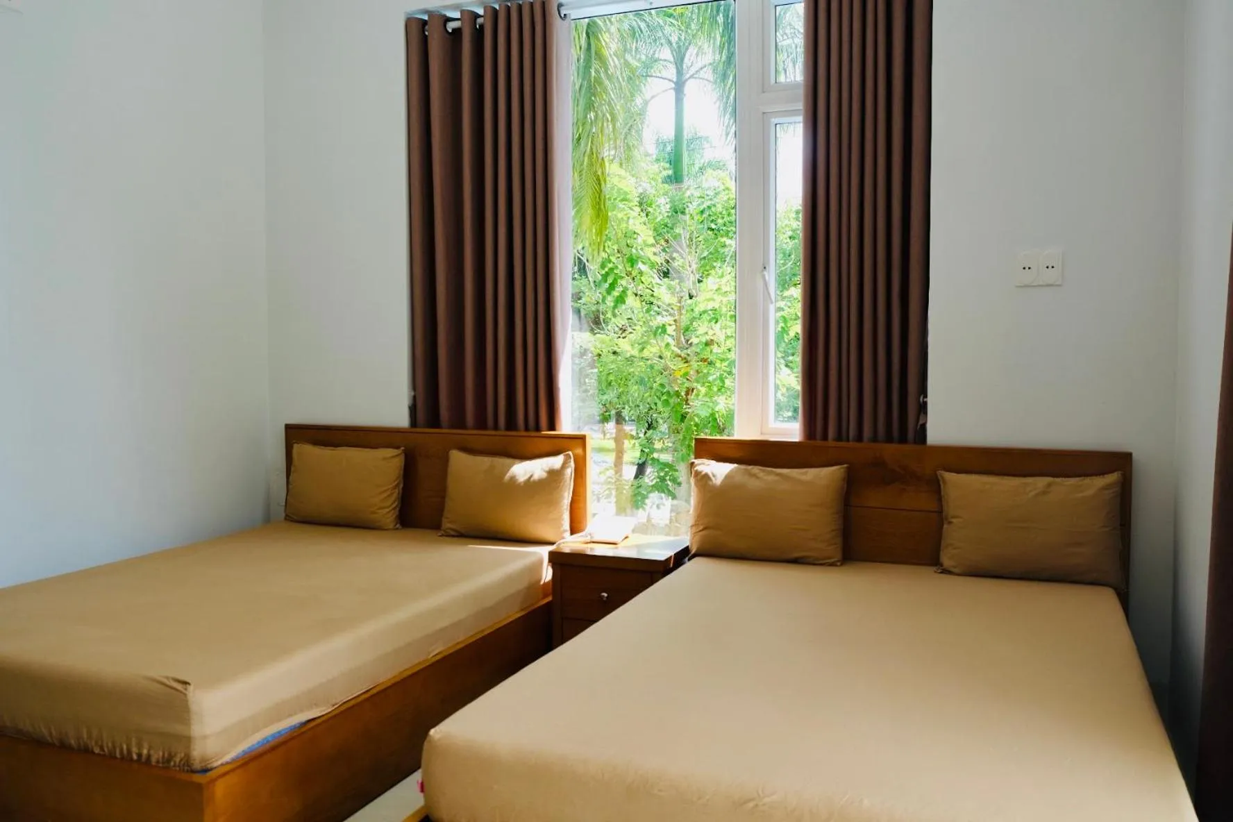 Bed in Tuyet Suong Villa Hotel