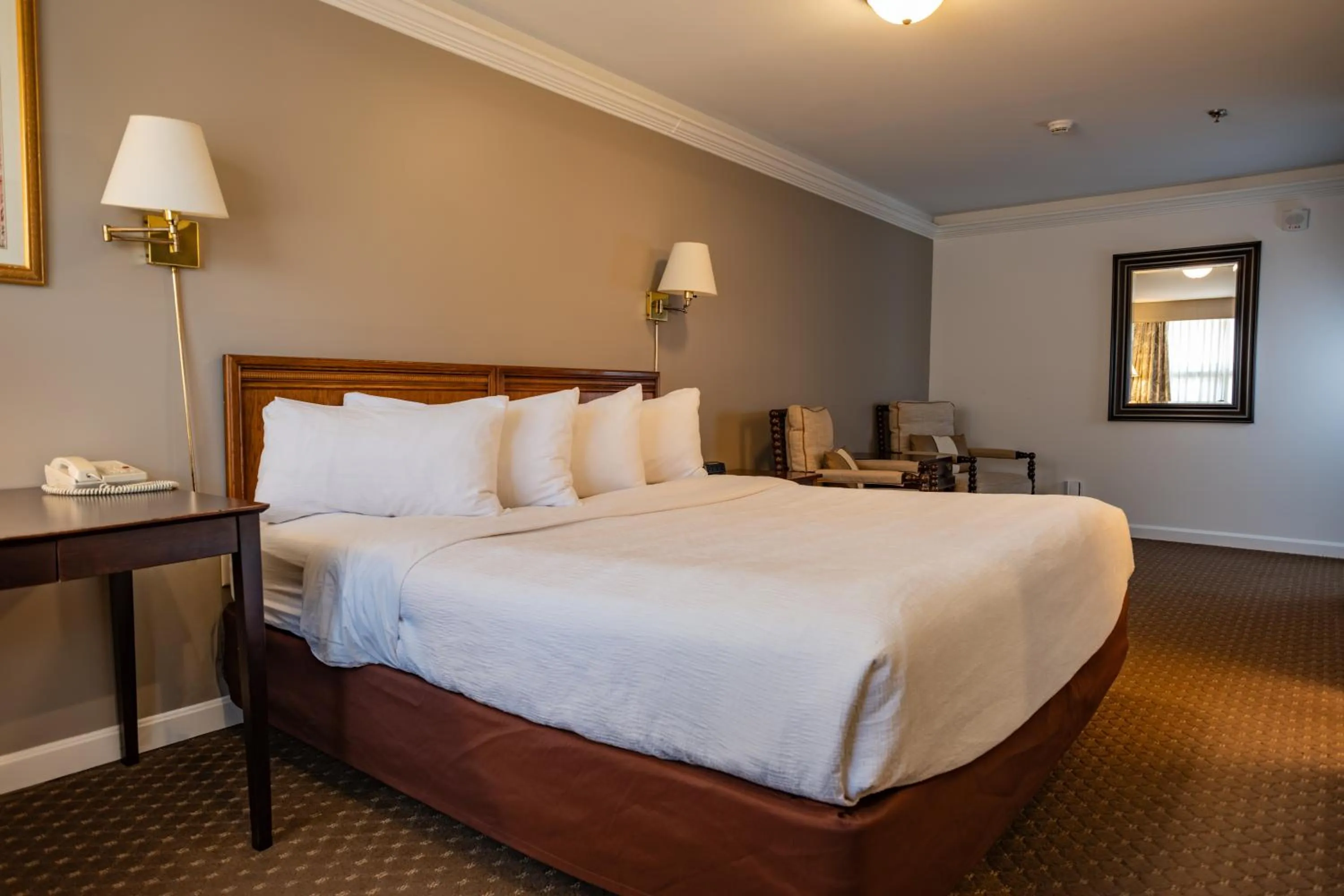 Bed in Senator Inn & Spa