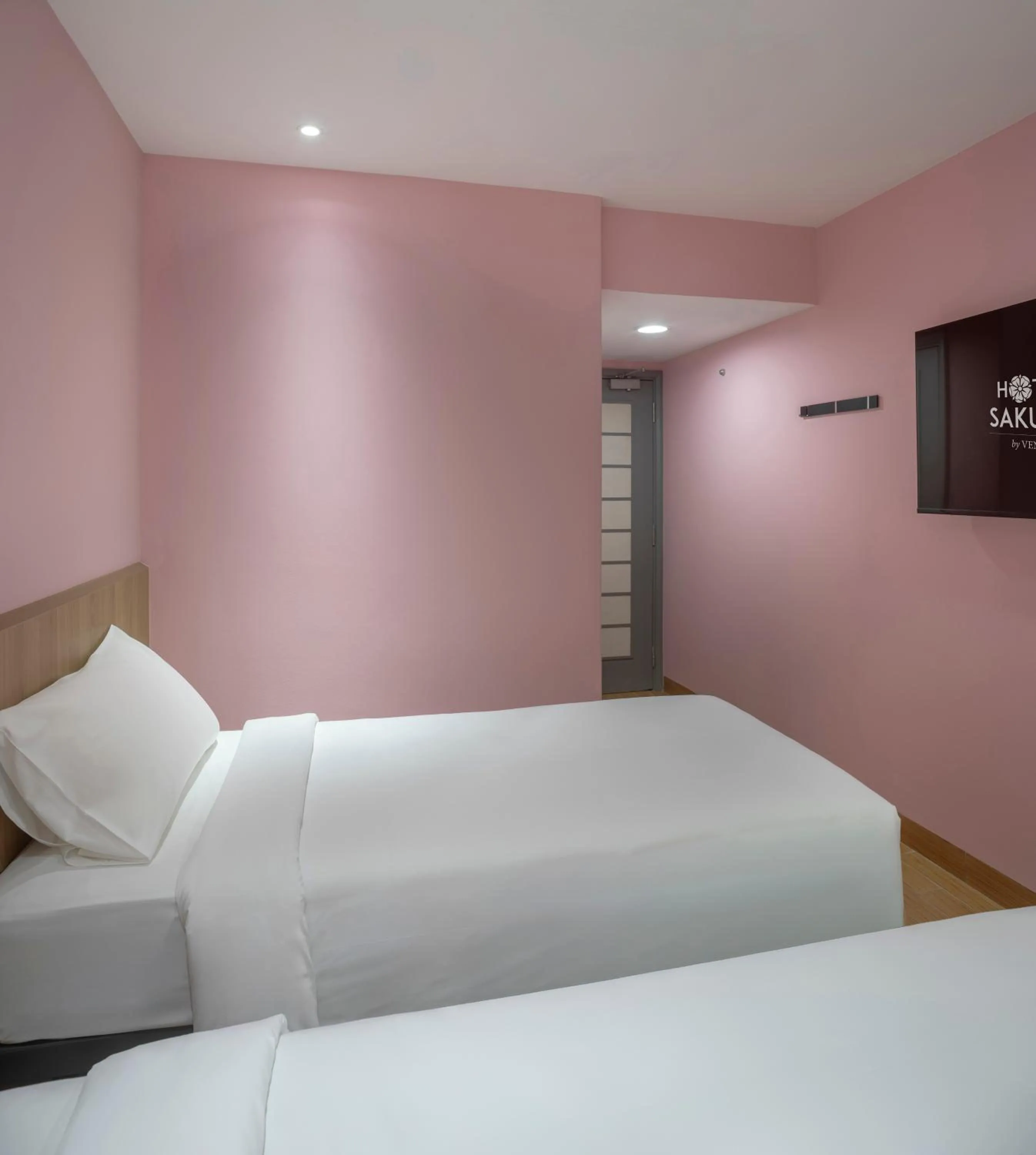 Bed in Hotel Sakura by Venue