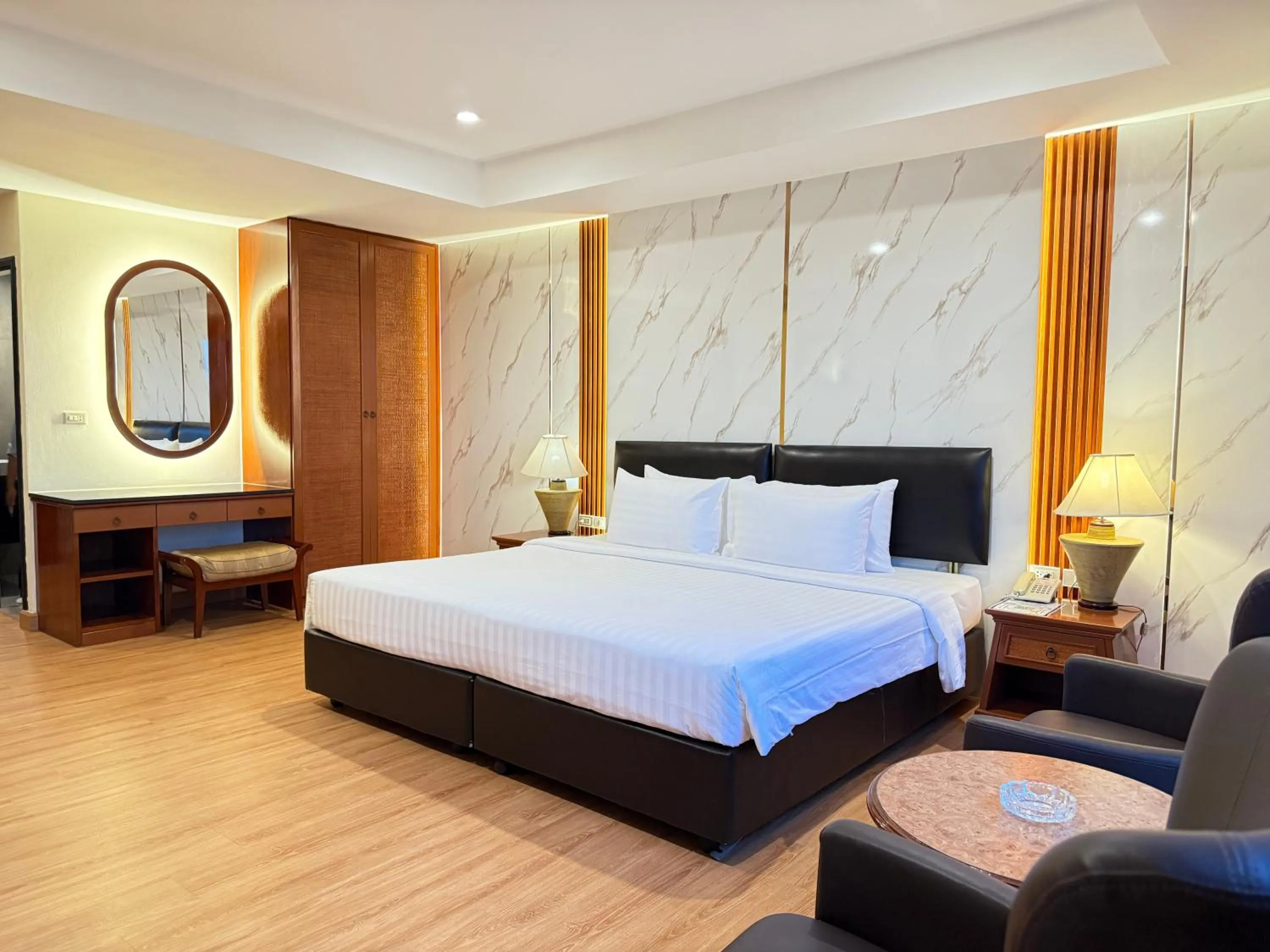 Bed in Nova Park Hotel Pattaya