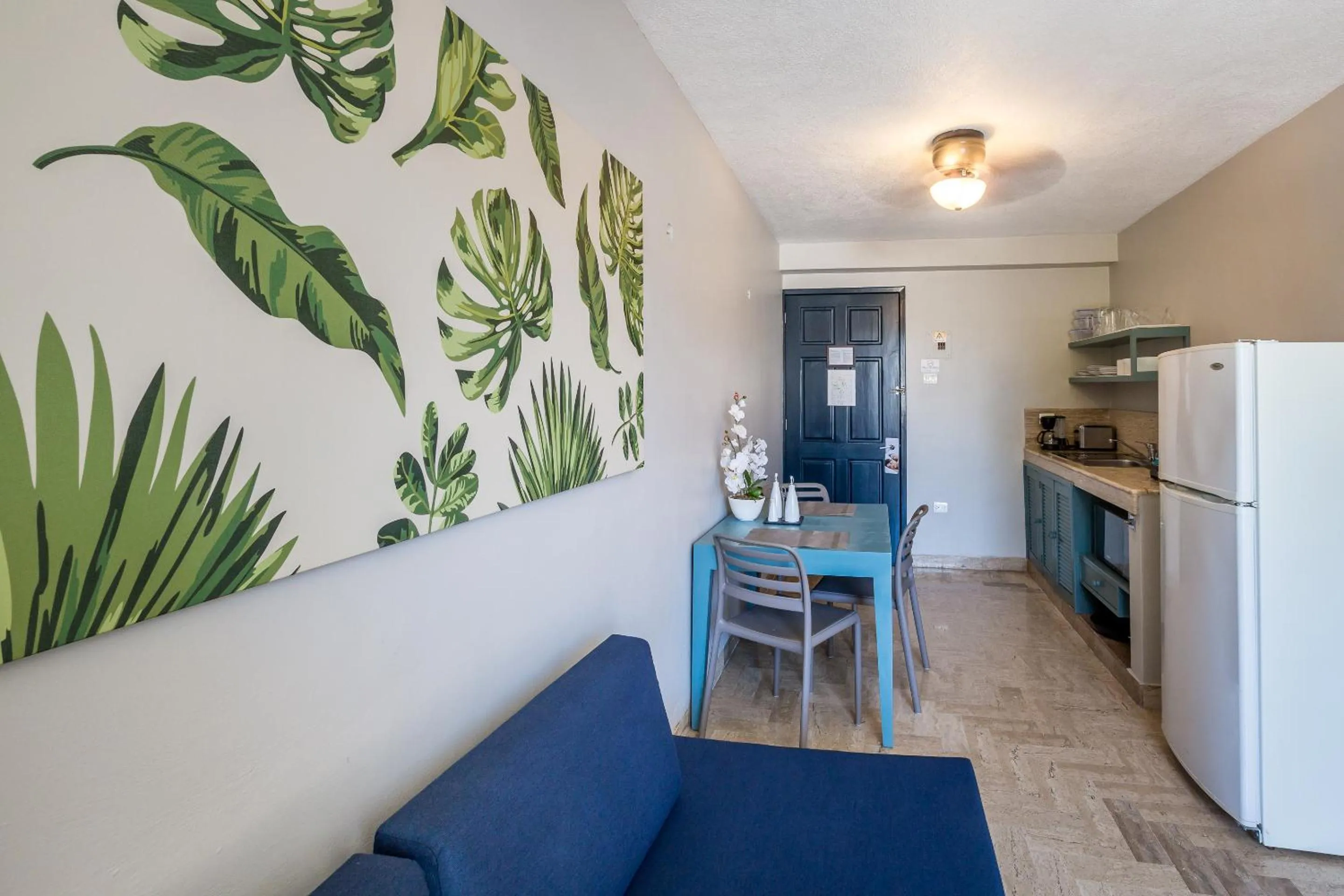 Dining area in "5th Av" Sol del Caribe Apart Hotel