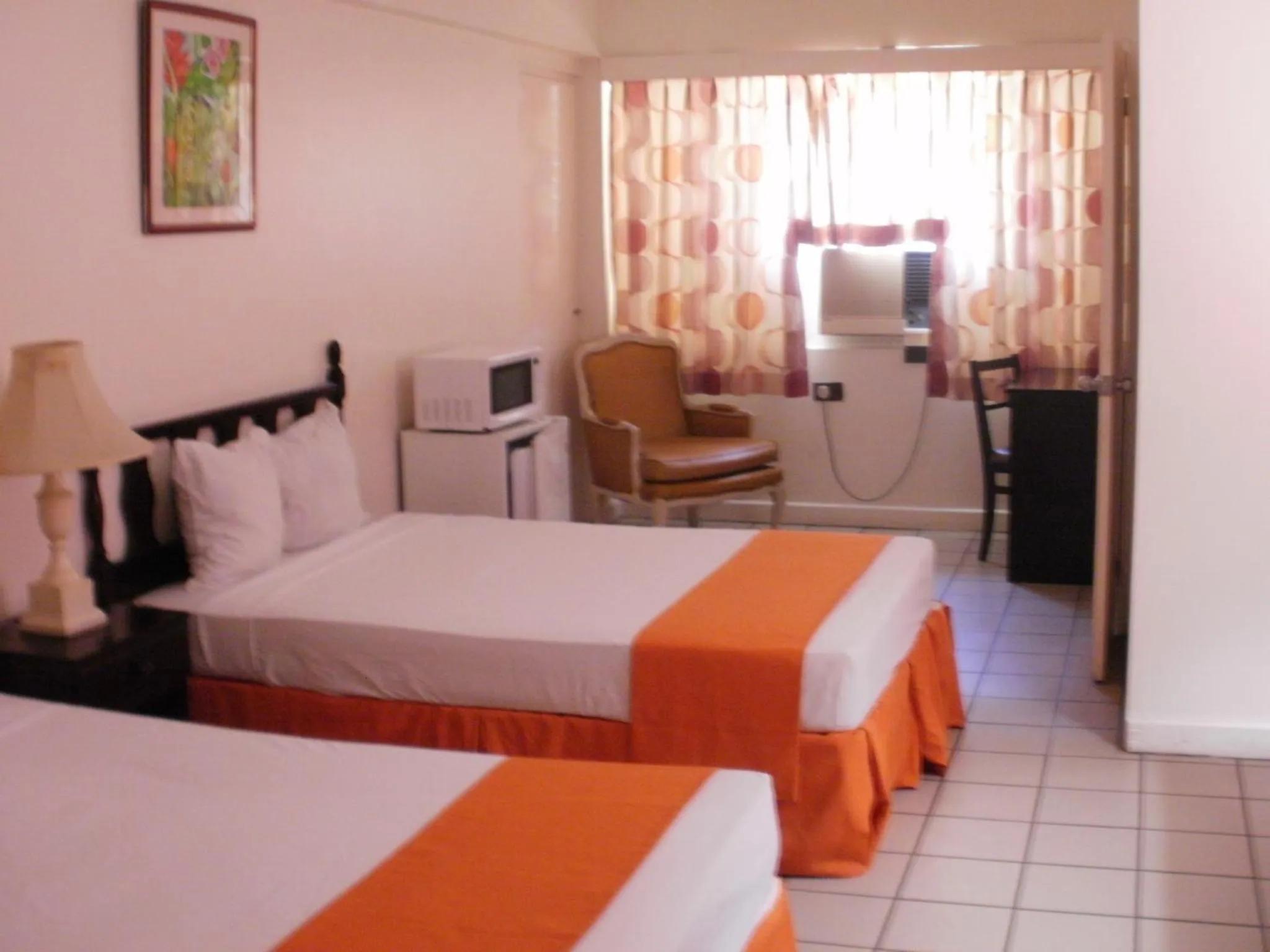 Photo of the whole room, Bed in Pineapple Court Hotel