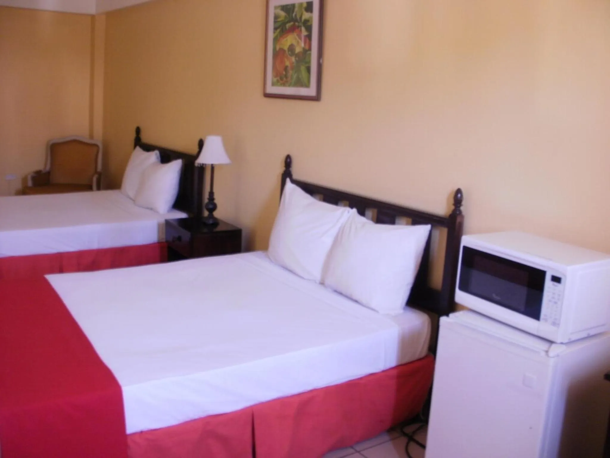 Photo of the whole room, Bed in Pineapple Court Hotel