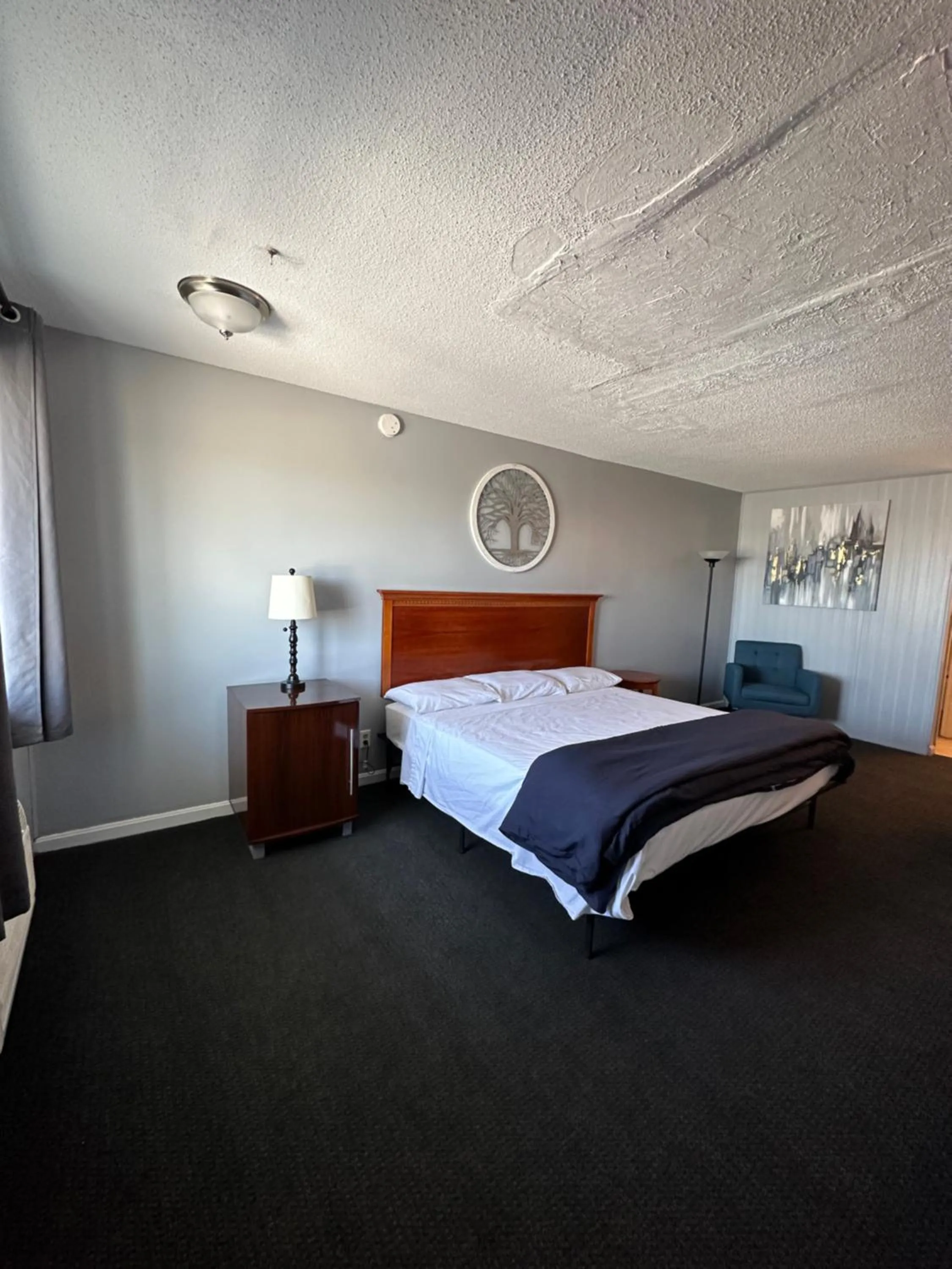 Bedroom in Paxton Inn Motel