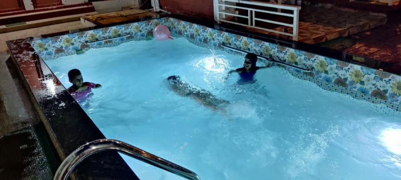 Swimming pool in Redstone House by Oxystays Hospitality