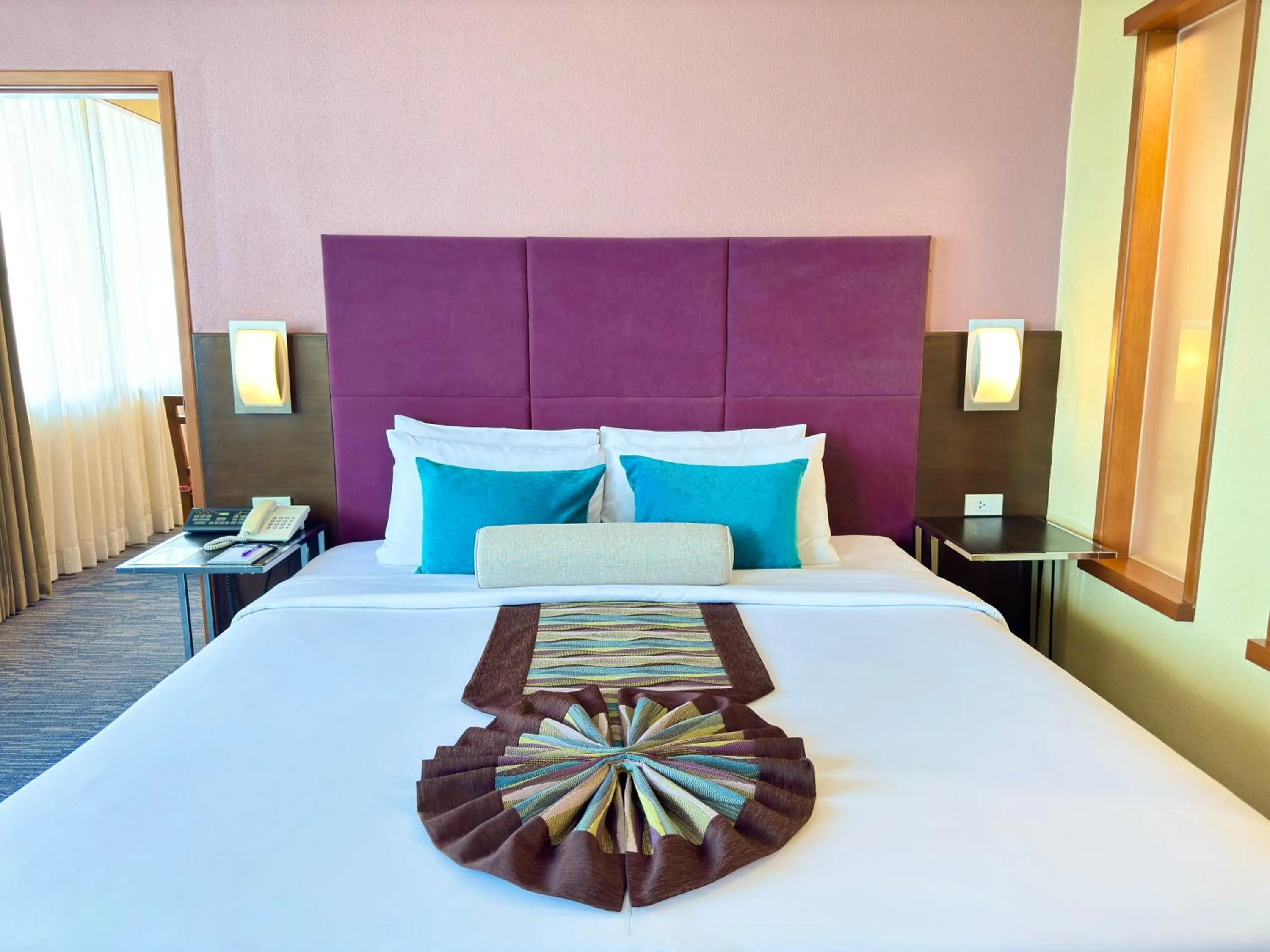 Bedroom, Bed in Phuket Merlin Hotel