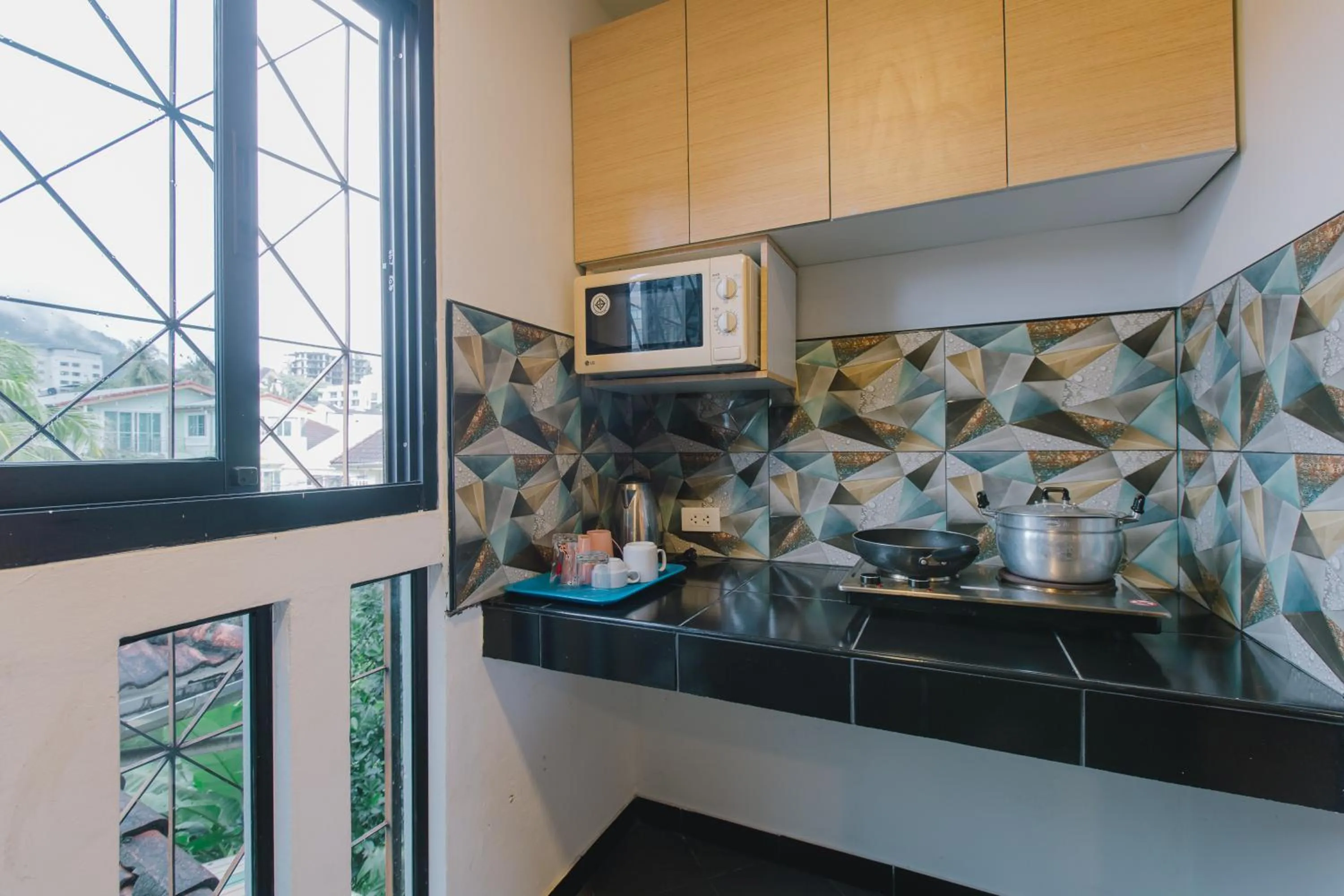 Kitchen or kitchenette in Royal Prince Residence, Patong Beach