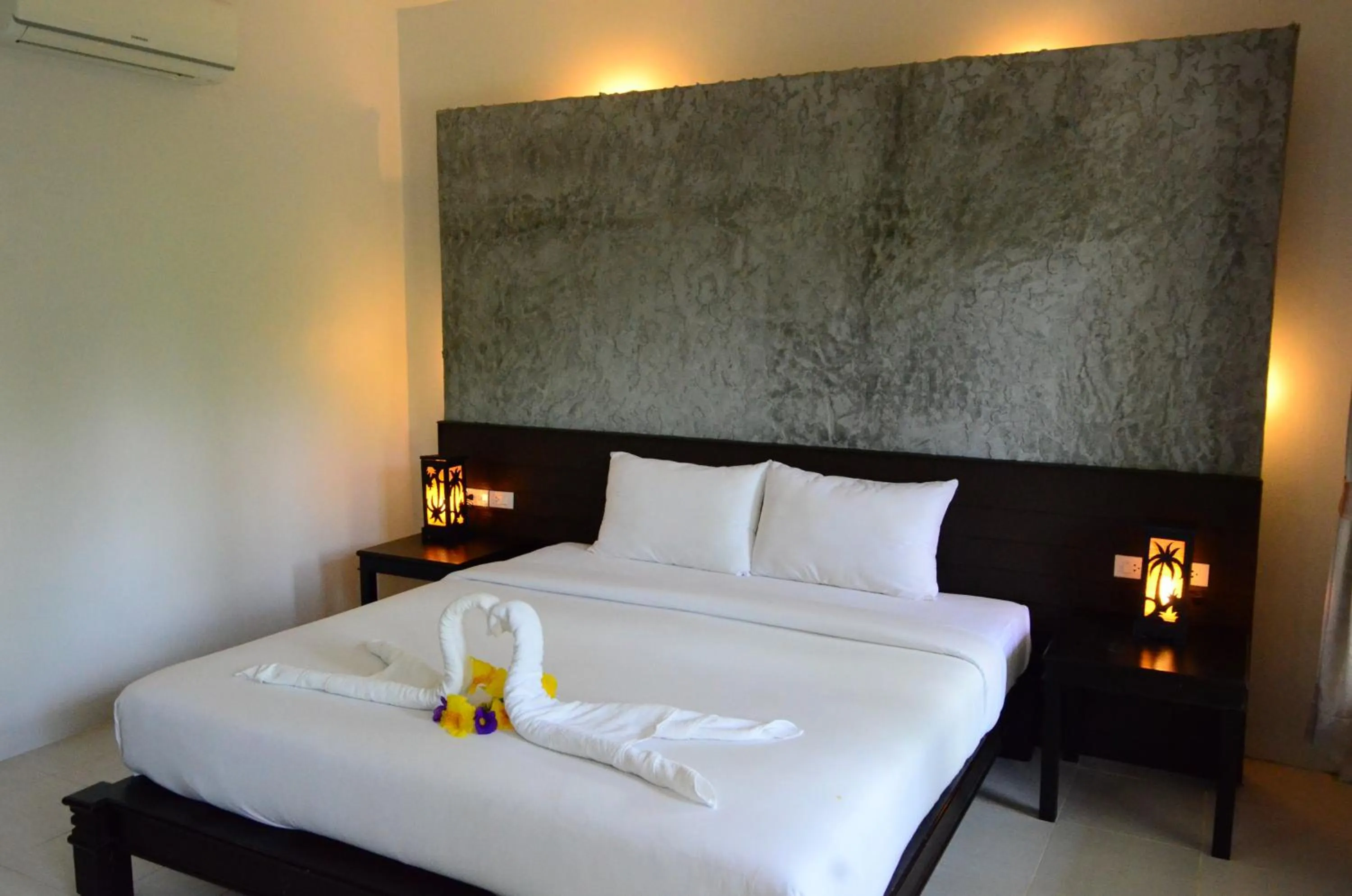 Bed in Khaolak Suthawan Resort - SHA Plus