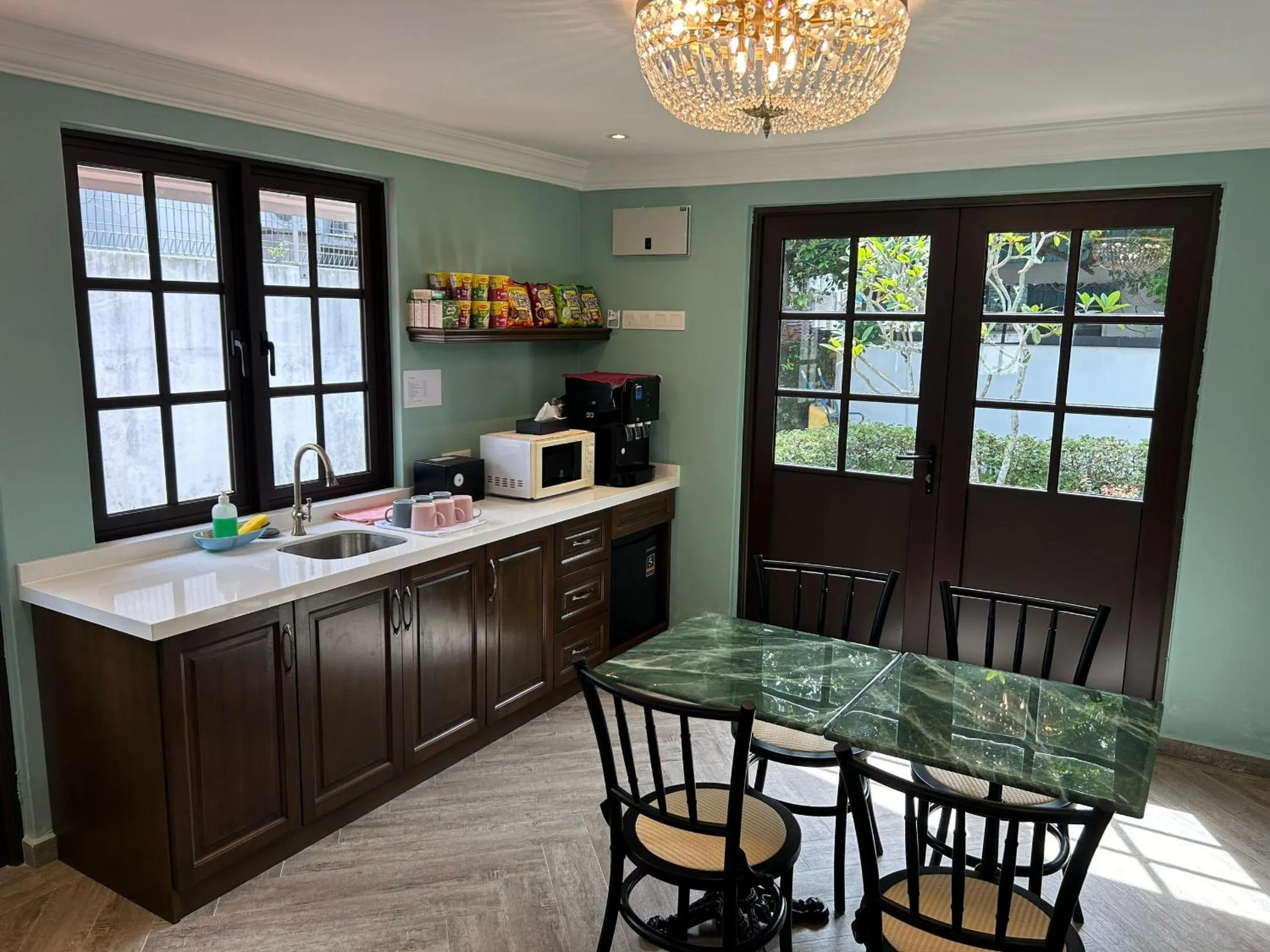 Communal lounge/ TV room in The Tudor