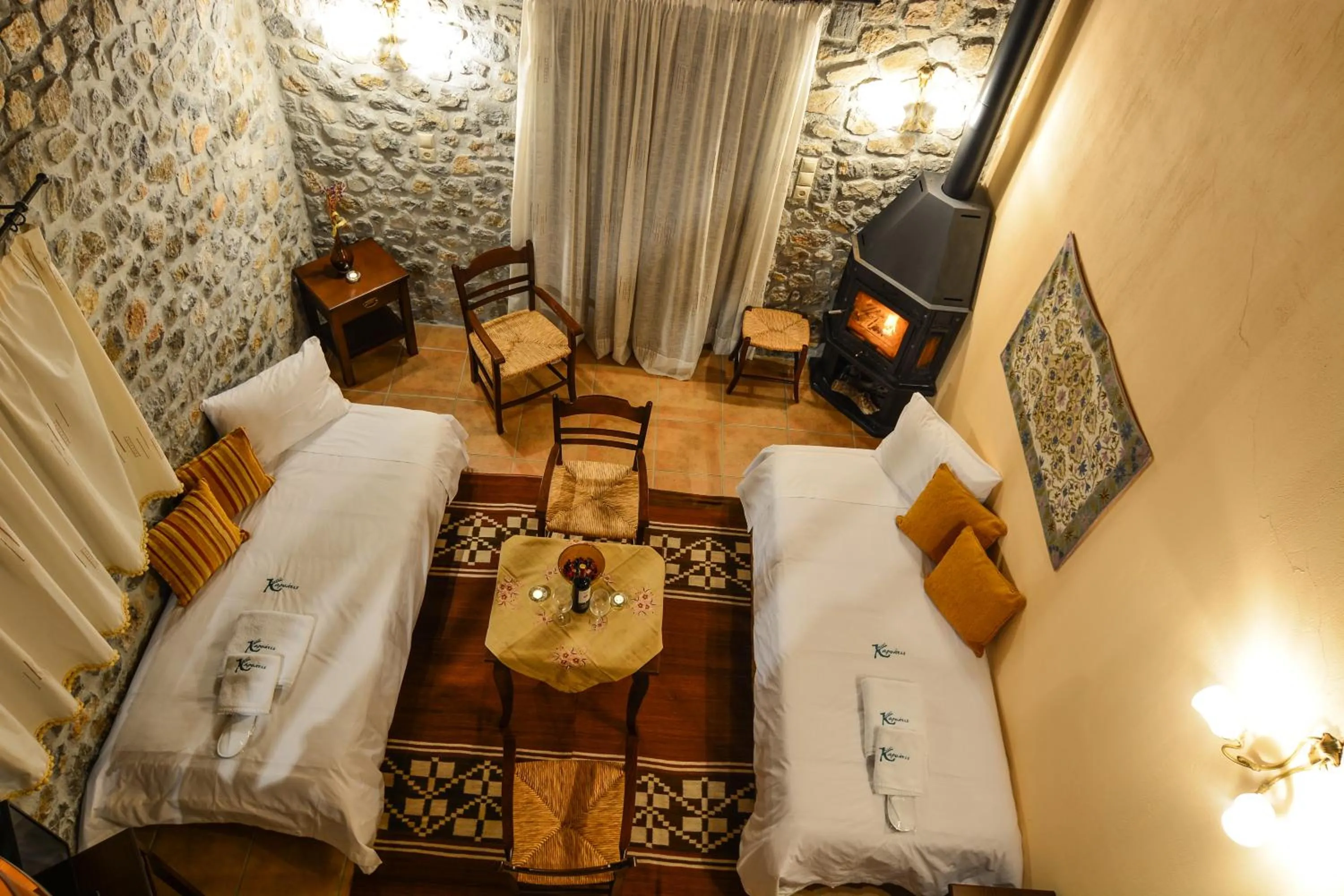 Seating area, Bed in Karyatis Resort