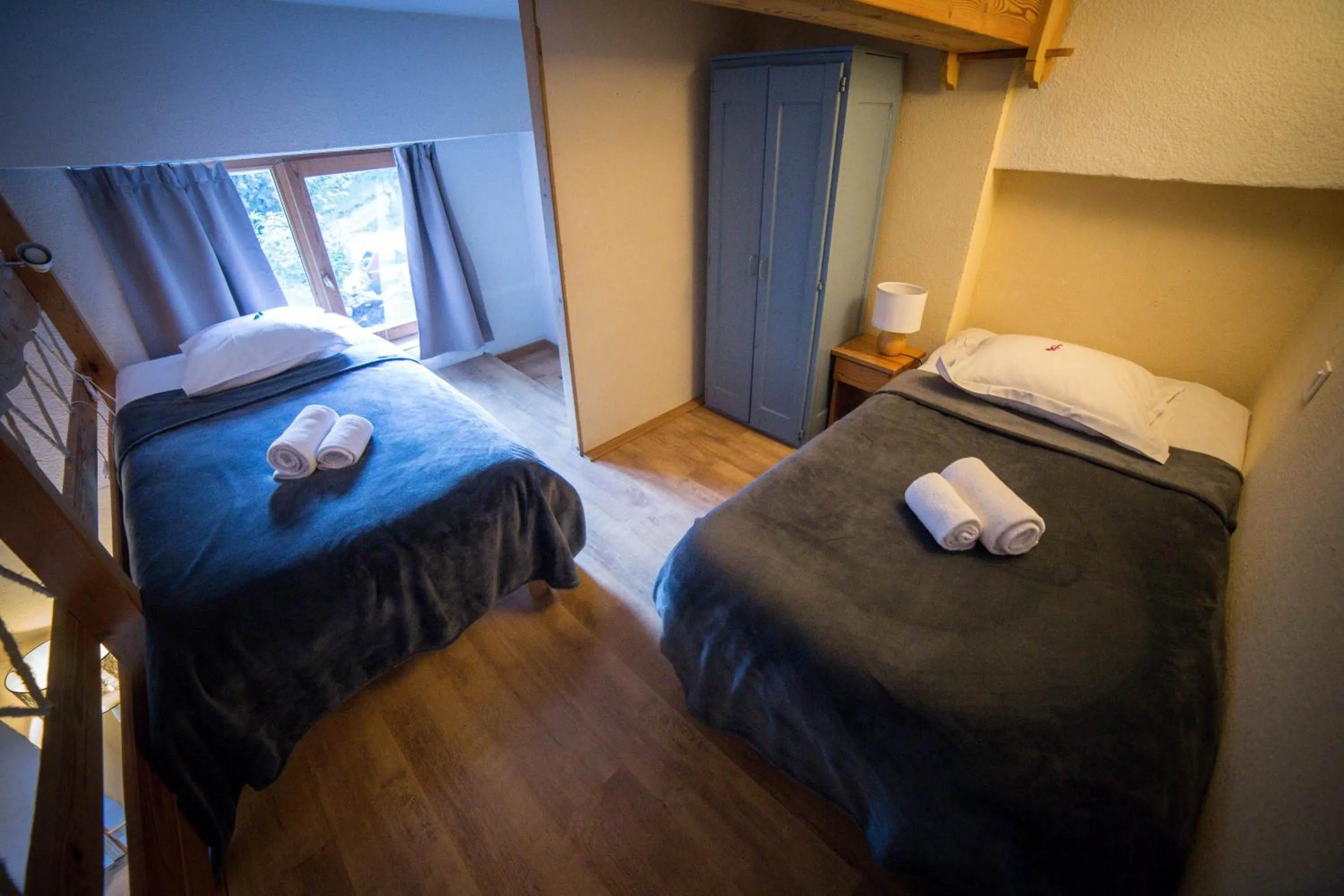 Bed in Hôtel Restaurant Gîtes Les 5 Saisons