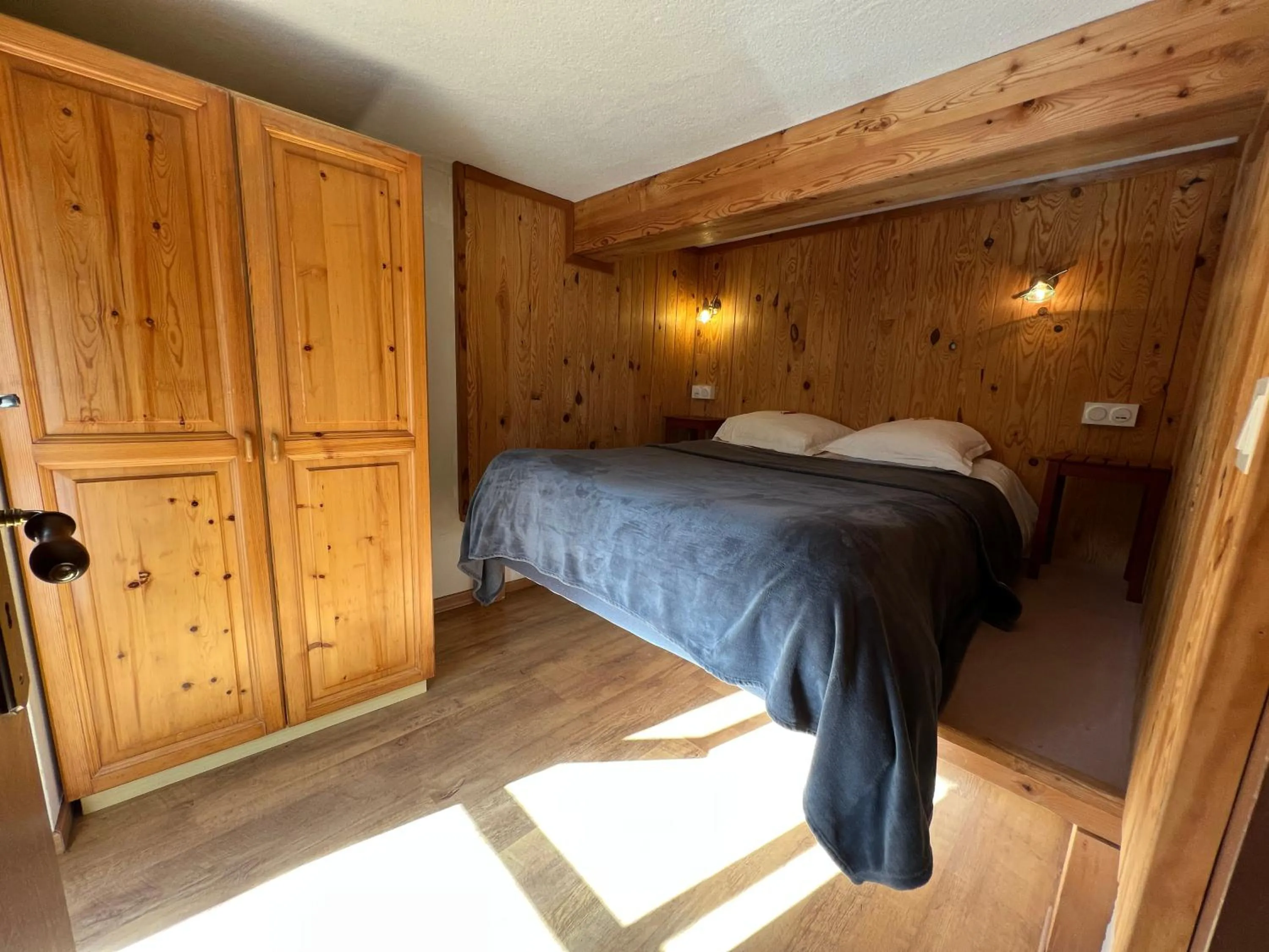 Bed in Hôtel Restaurant Gîtes Les 5 Saisons