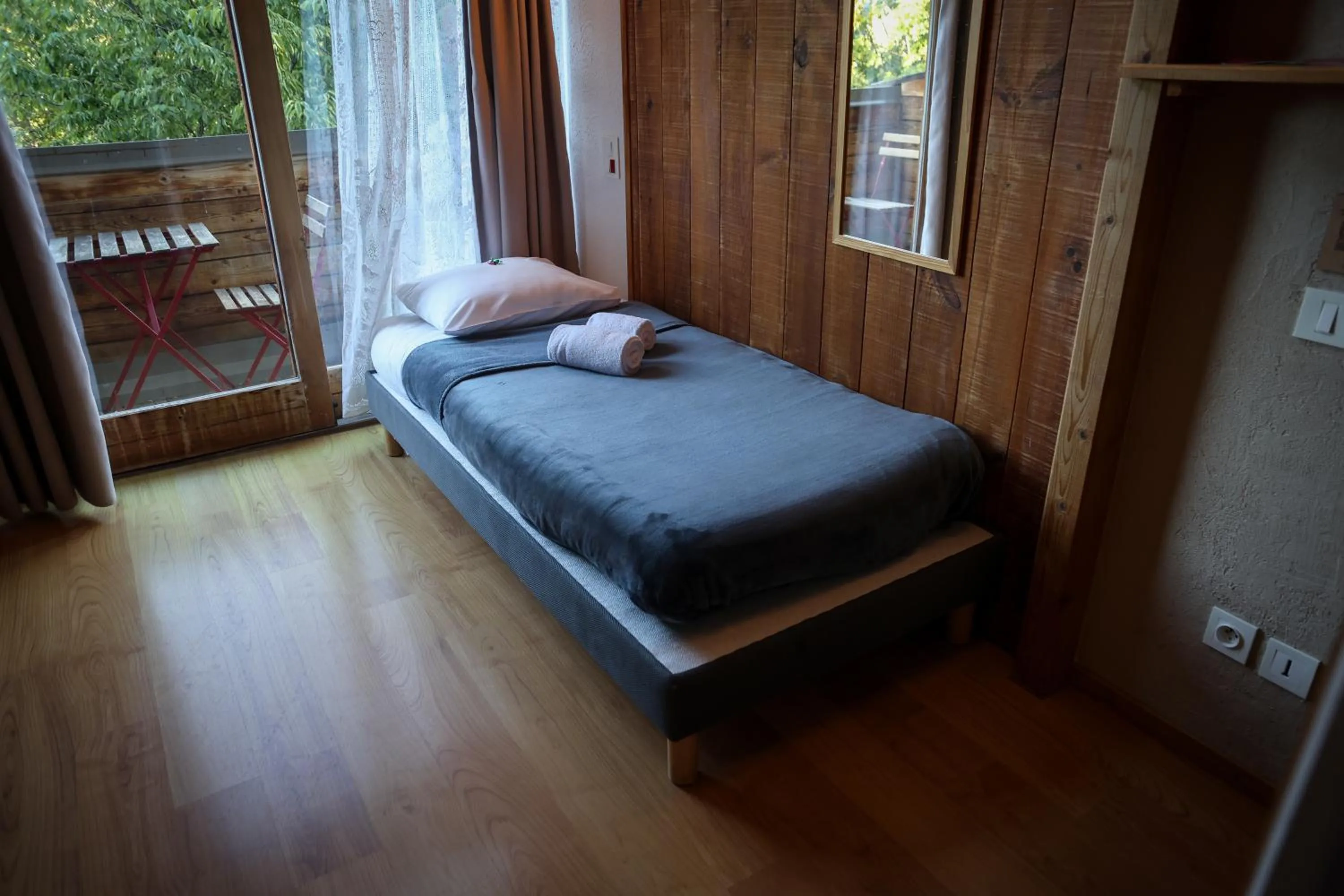 Bed in Hôtel Restaurant Gîtes Les 5 Saisons